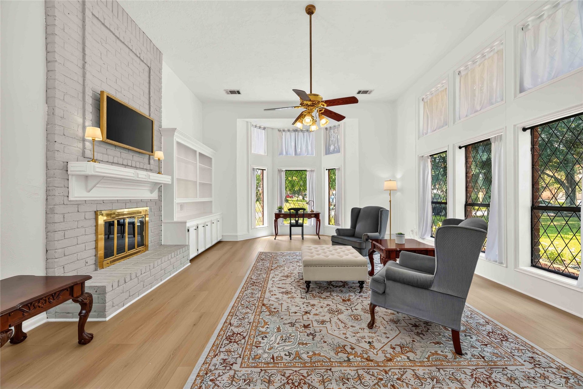 17006 Butteroak Drive, Spring, TX 77379 Gather around the fireplace and enjoy a living space enhanced
by high ceilings, built-in storage and natural light.