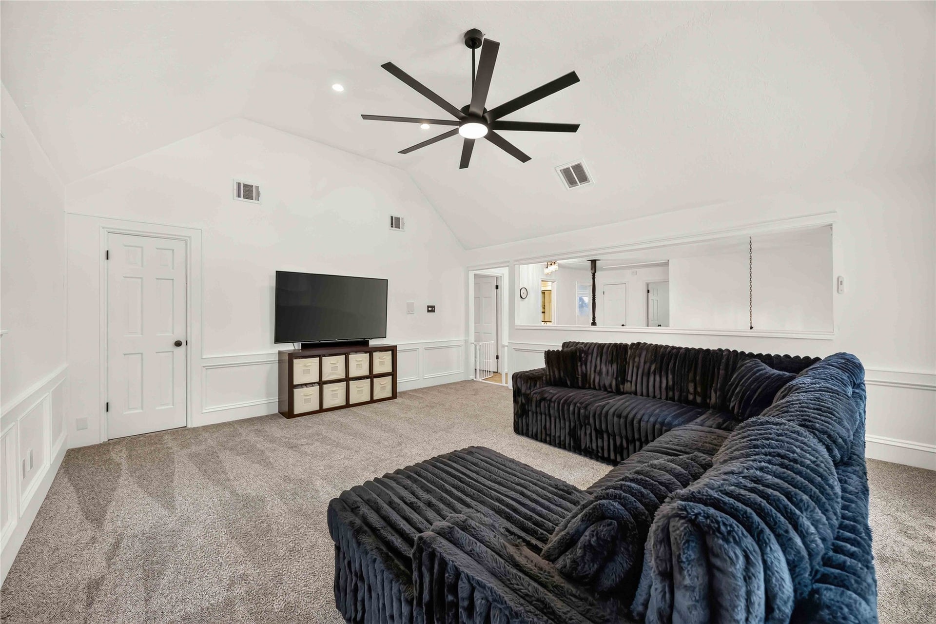 17006 Butteroak Drive, Spring, TX 77379 With room for large-scale seating and entertainment, this game room is ready for movie nights,
game days and family fun.