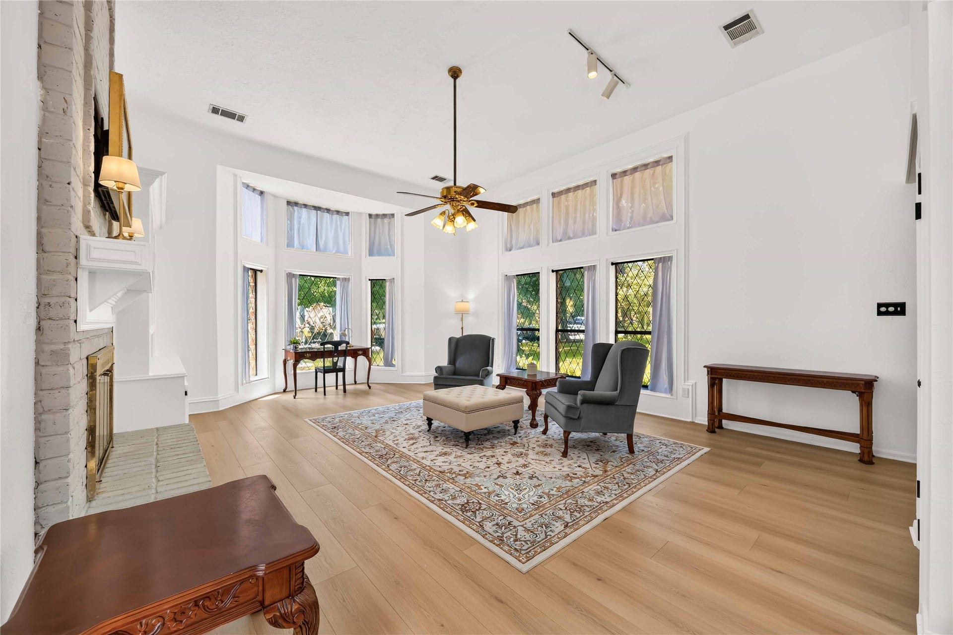 17006 Butteroak Drive, Spring, TX 77379 Expansive windows fill the living area with sunlight while providing plenty of room to create comfortable conversation and
entertainment spaces.