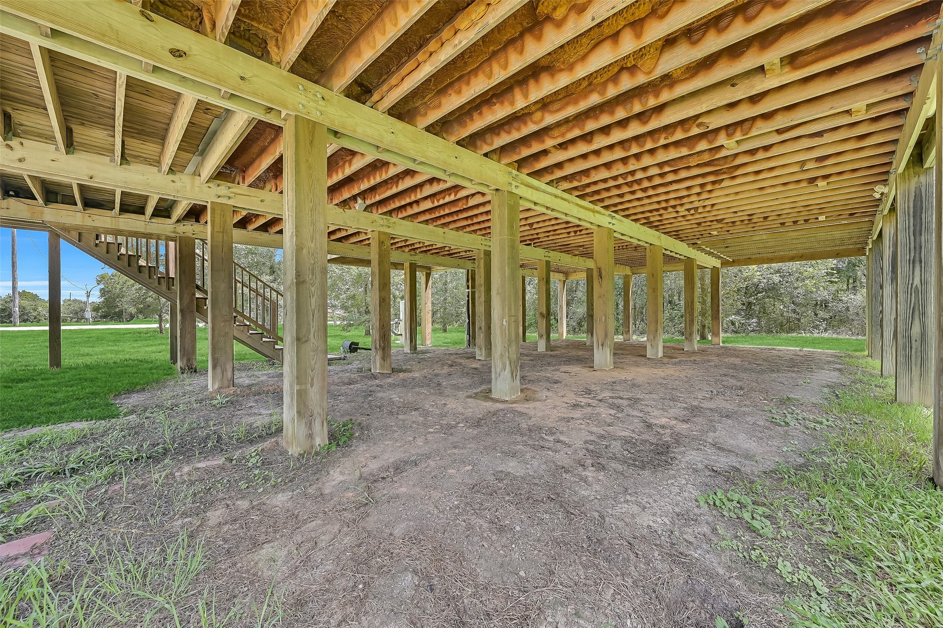 11930 Bastrop Beach Road, Angleton, TX 77515 The elevated design creates an impressive amount of covered parking, storage, or future outdoor living space beneath the home. Added foam insulation under the floor system enhances year-round comfort and energy efficiency.