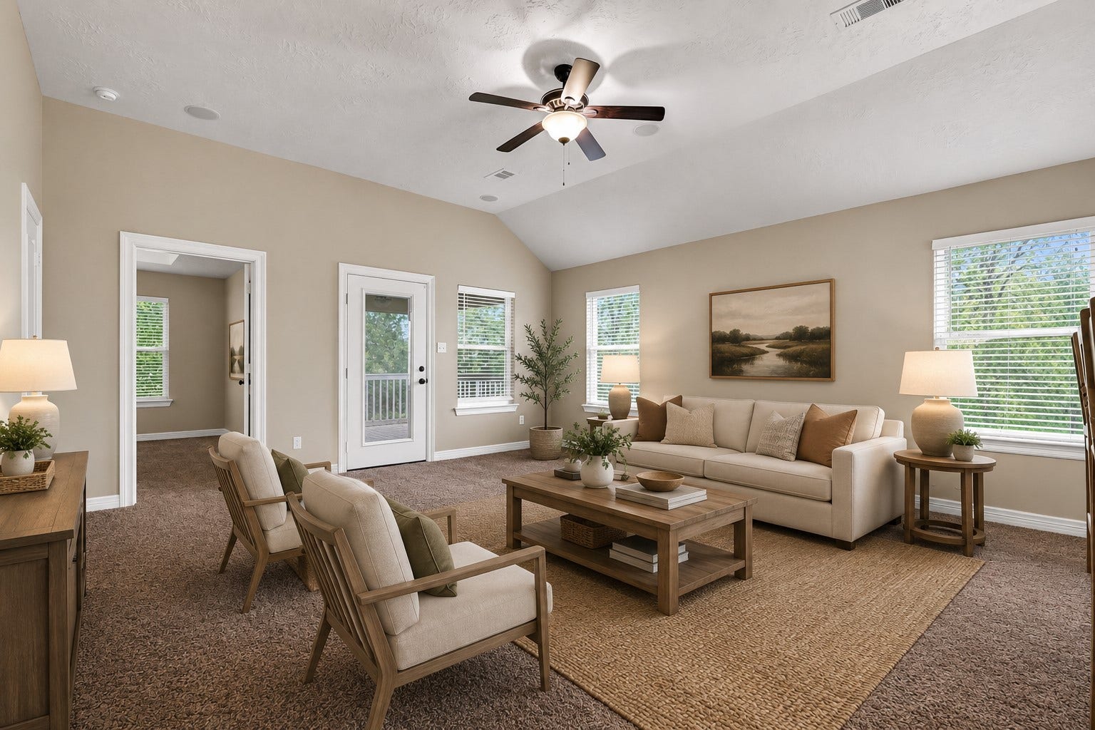 11930 Bastrop Beach Road, Angleton, TX 77515 Large windows frame peaceful views of the surrounding trees while the spacious family room offers vaulted ceilings, surround sound speakers, and direct access to the covered porch for effortless indoor-outdoor living. (Virtually Staged)