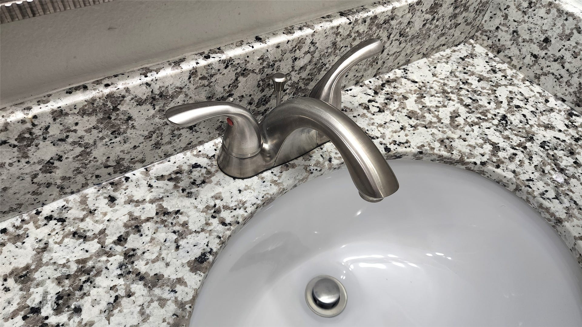 419 N Parrish Street, Angleton, TX 77515 Close-up of the primary bath sink and granite.