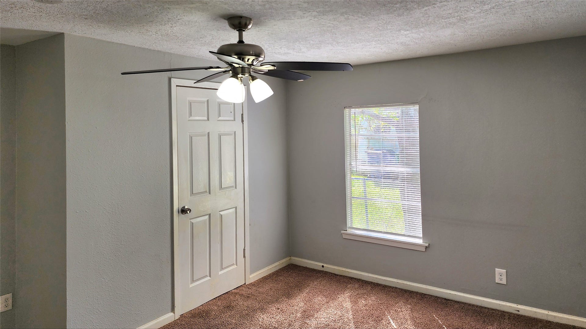 419 N Parrish Street, Angleton, TX 77515 Another view of the primary suite, showing the window and entry.