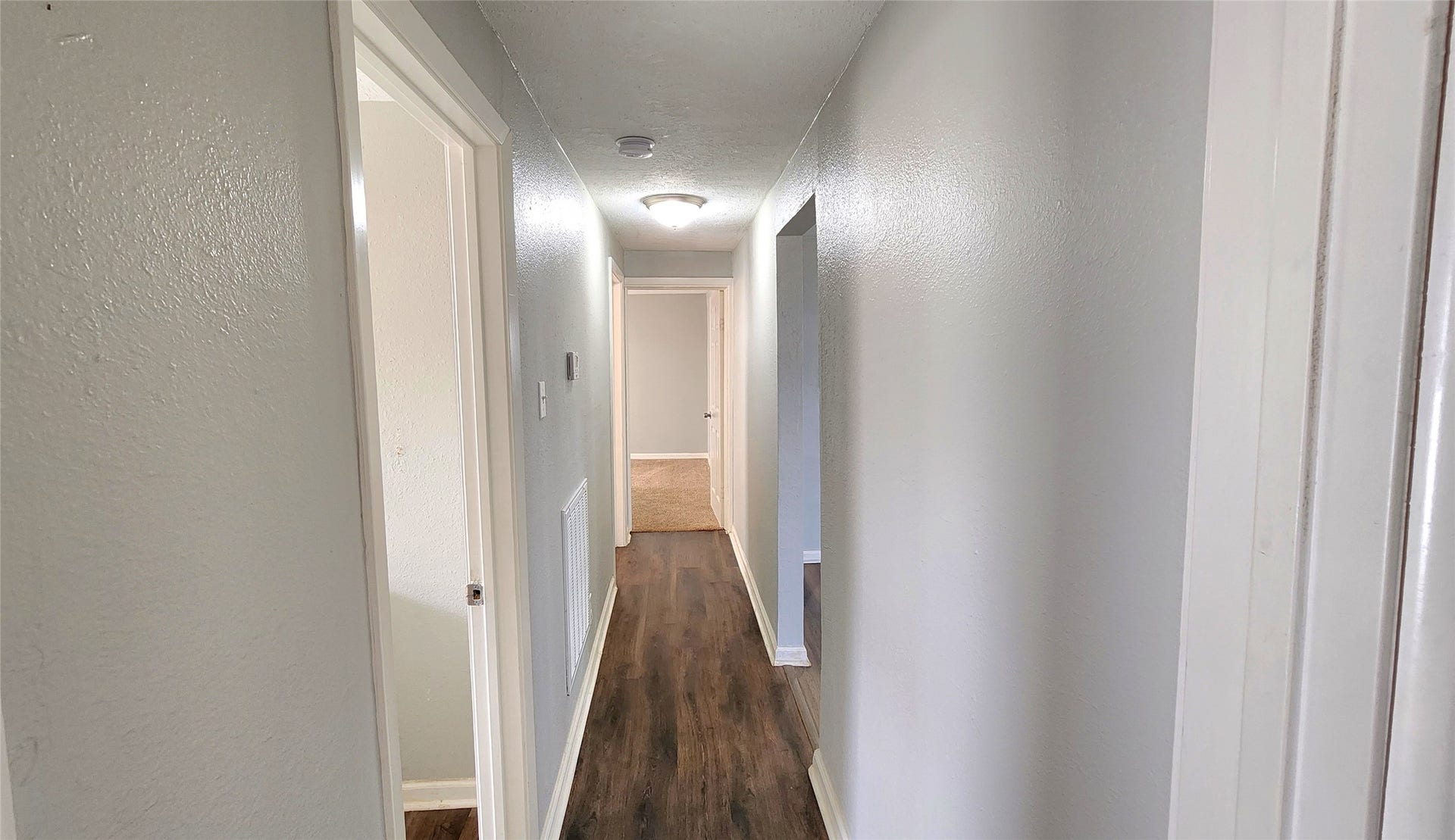 419 N Parrish Street, Angleton, TX 77515 Hallway connecting the bedrooms and baths.