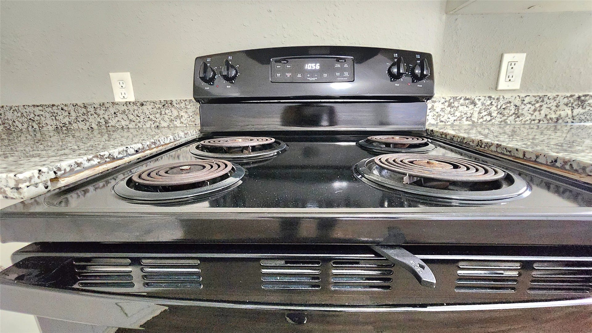 419 N Parrish Street, Angleton, TX 77515 Electric range with four burners.