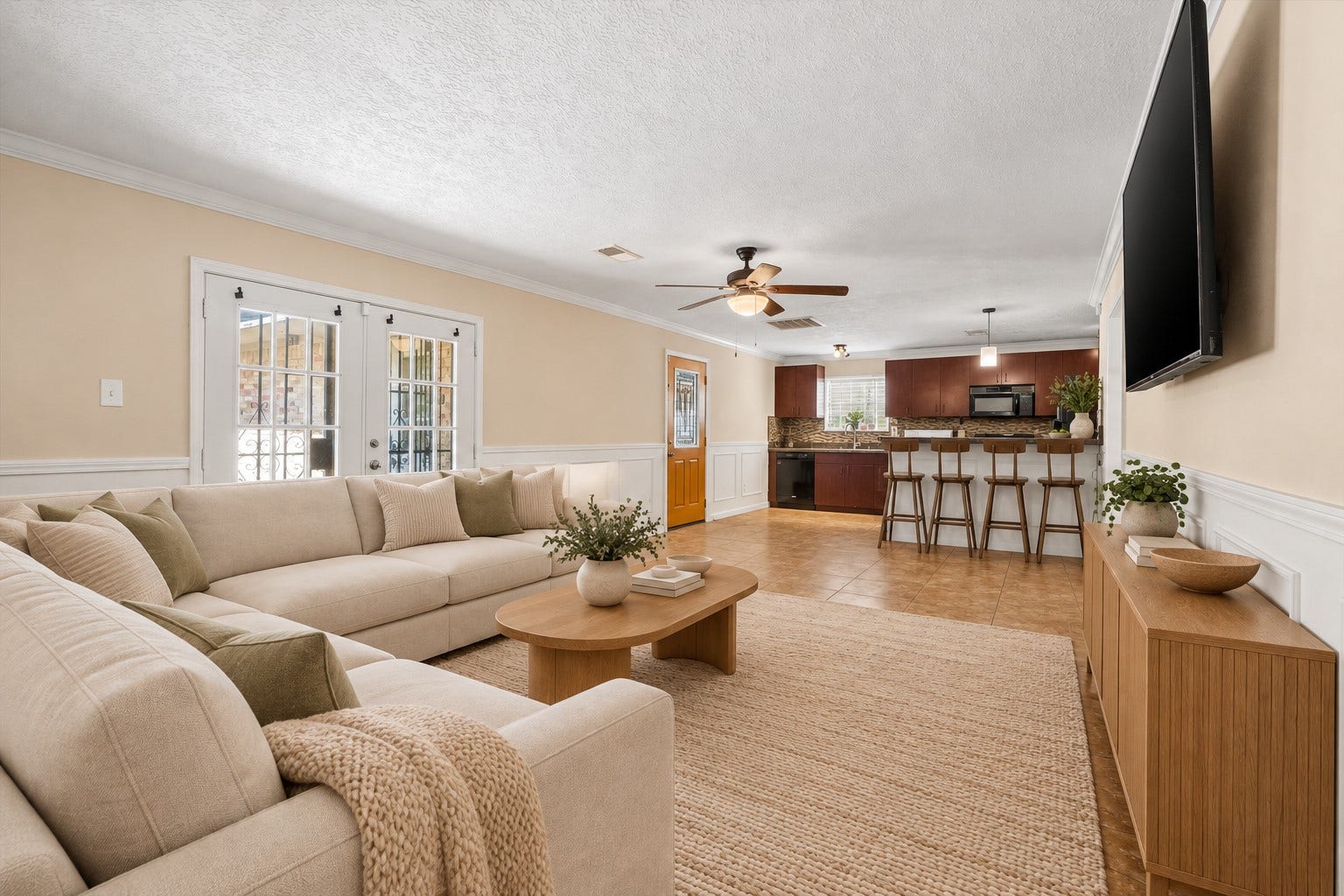 The living room boasts an open layout to the kitchen, creating a seamless flow thats perfect for entertaining and everyday living. *Virtually Staged