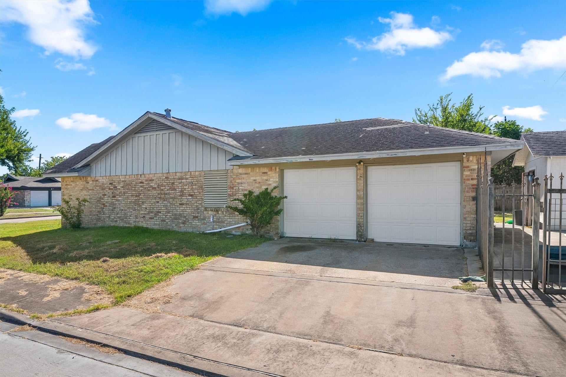 Enjoy the convenience of an attached two-car garage, complemented by additional side parking for added flexibility and plenty of space for extra vehicles, guests, or recreational toys!