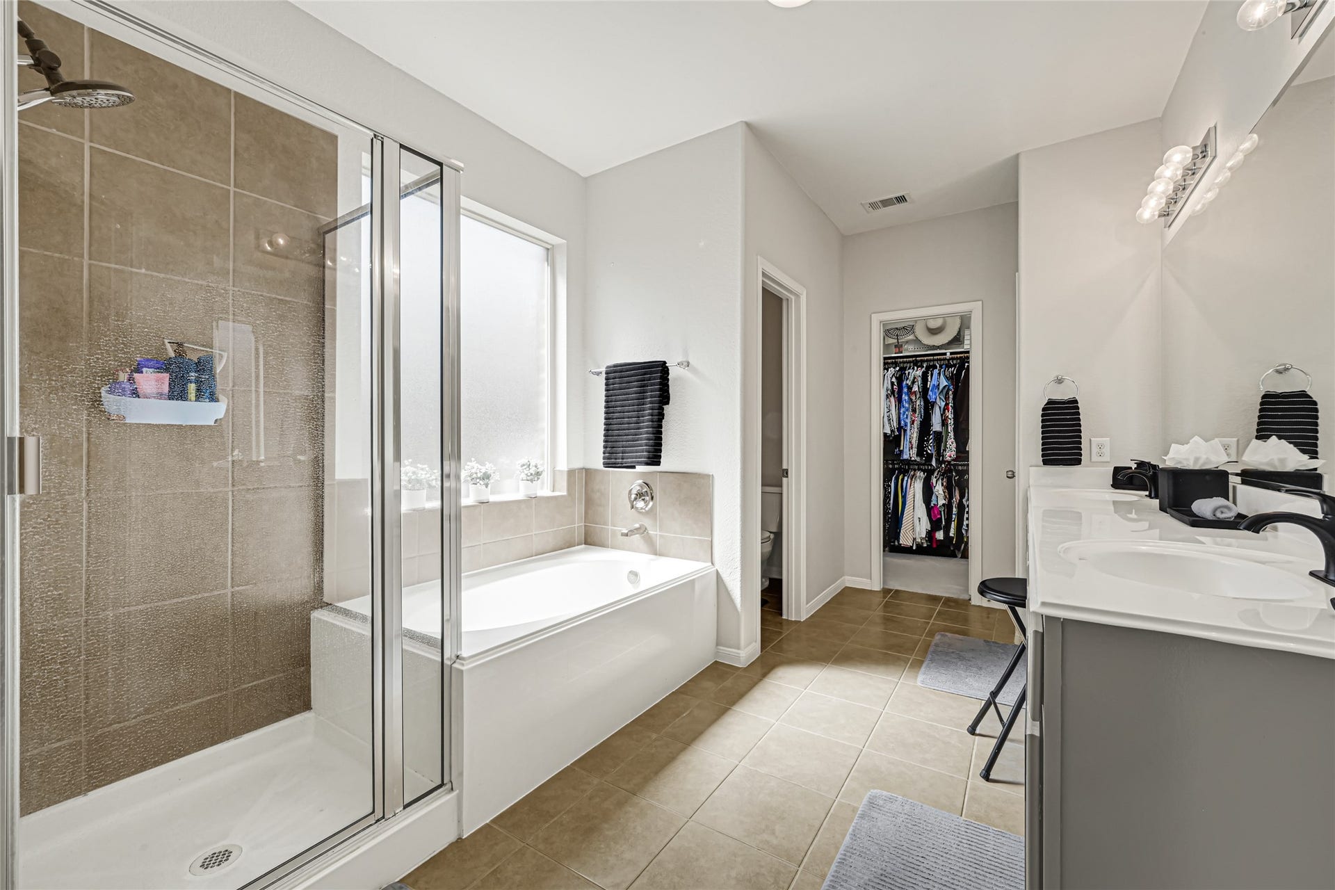 Master bathroom with separate shower and tub