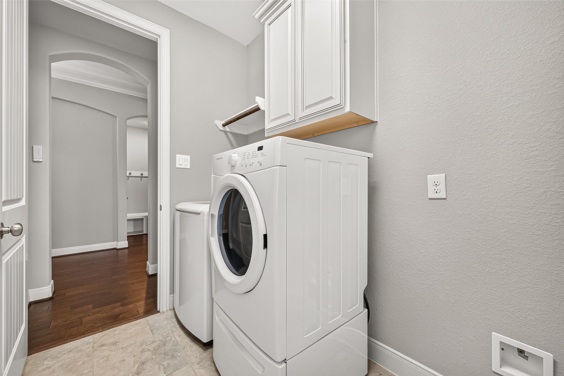 Laundry room with built-in cabinetry!