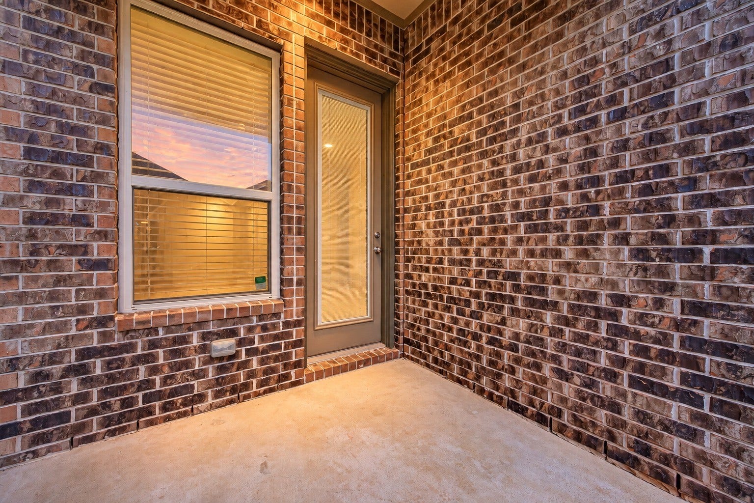 Step outside to enjoy the covered back patio and comfortable backyard space!