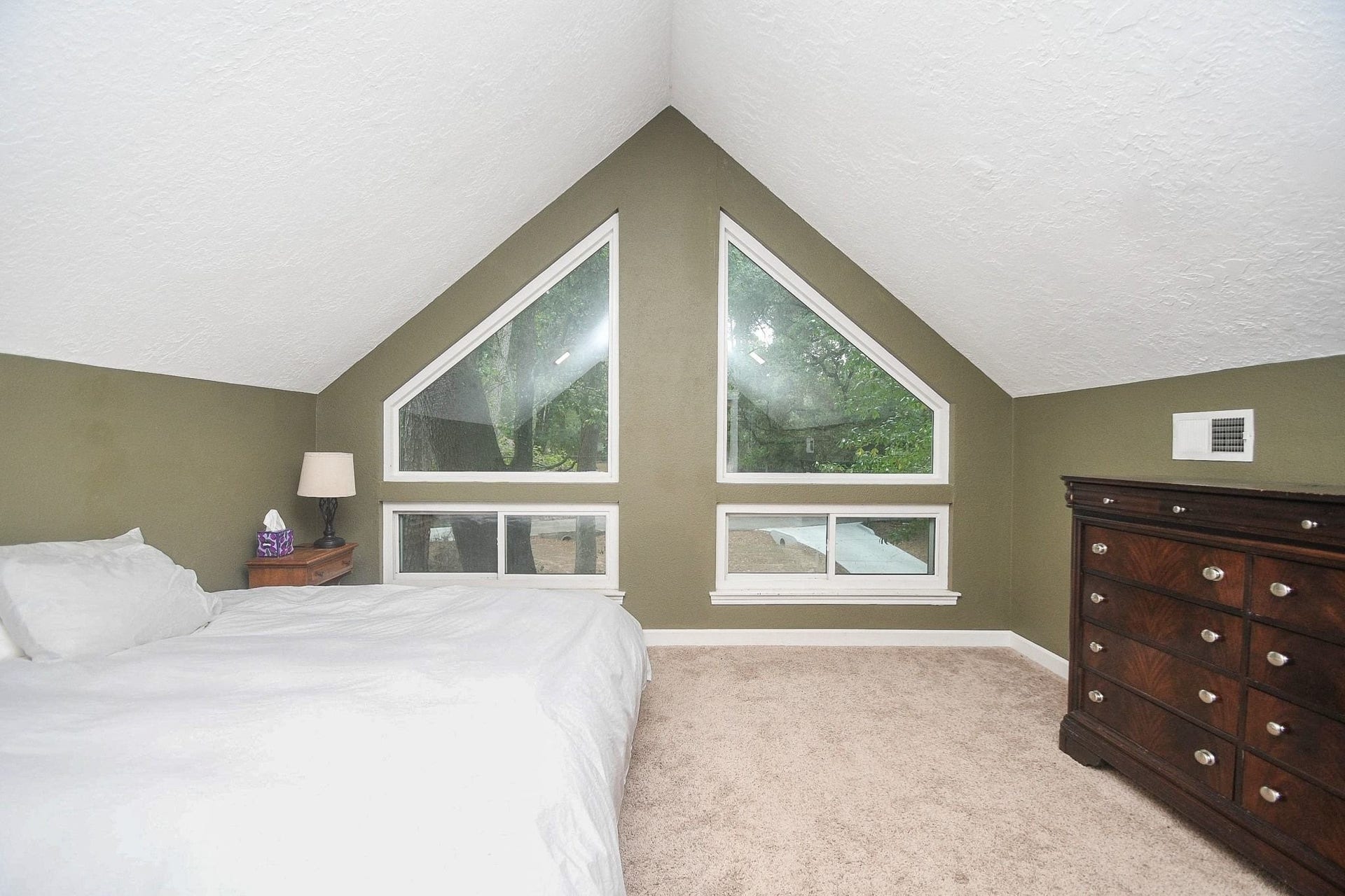 The Upstairs Bedroom with High Ceilings & a Full Bath could also be used as a Media Room, Home School Room, Play Room, etc.