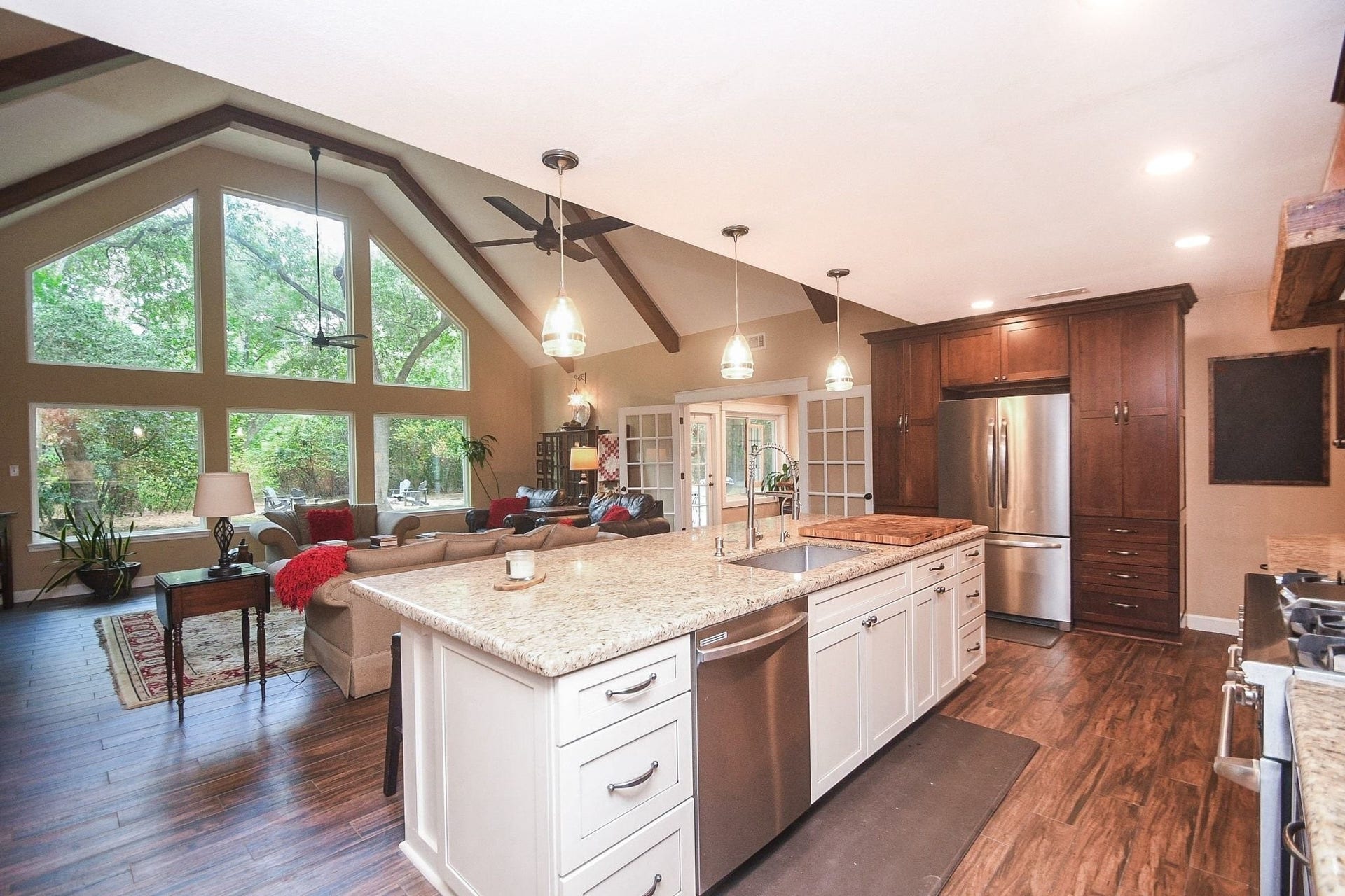 Open Island Kitchen with Custom Cabinets, a Professional NXP Pro 6-Burner Gas Range with Griddle & Large Walk-In Pantry. Large Utility Room.