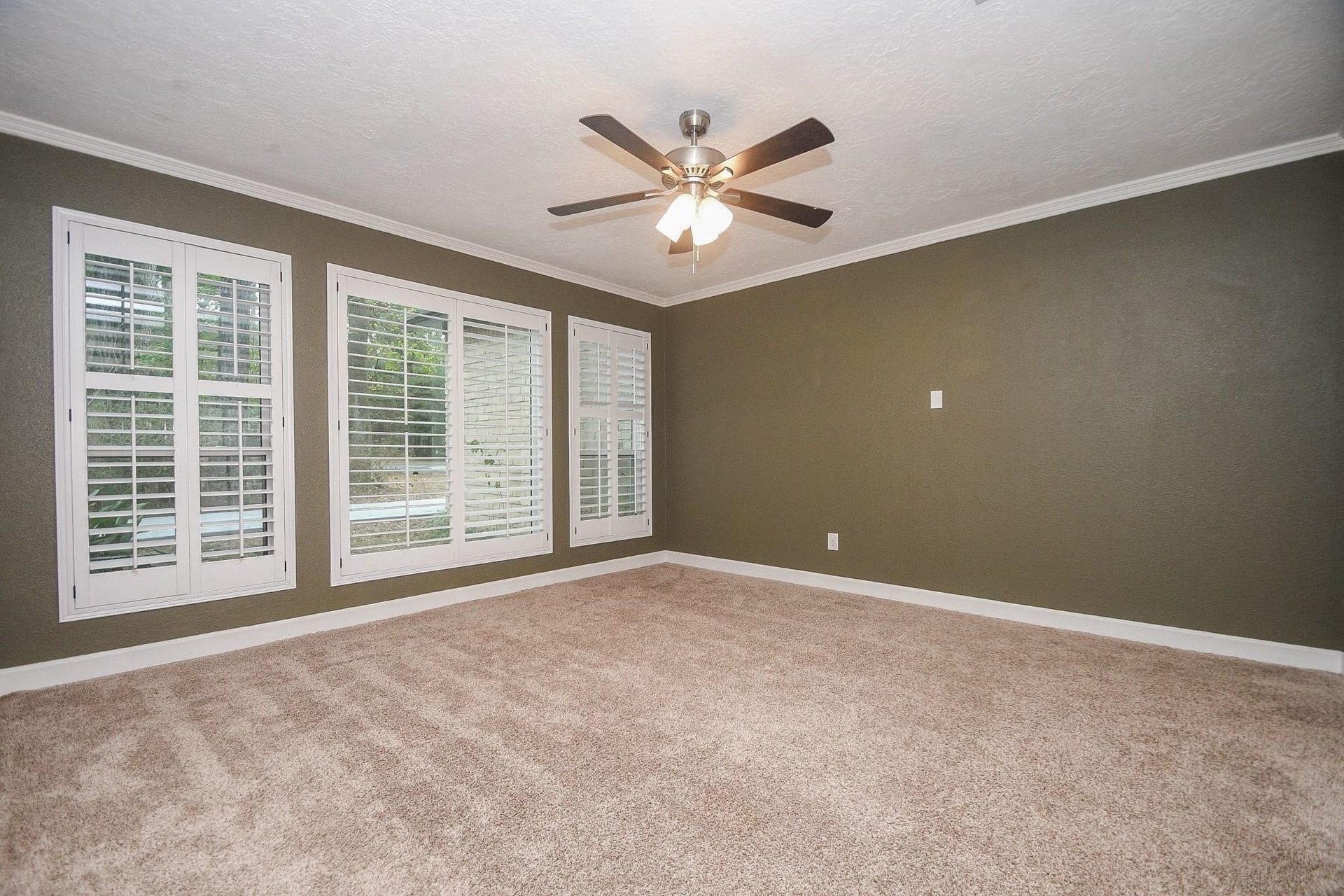 Downstairs Bedroom with Connecting Access to the Full Hall Bath.