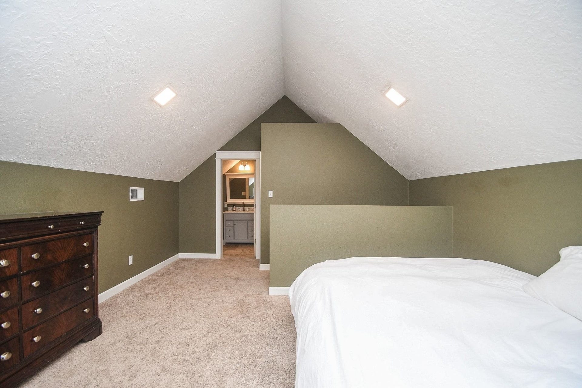 The Upstairs Bedroom with High Ceilings & a Full Bath could also be used as a Media Room, Home School Room, Play Room, etc.