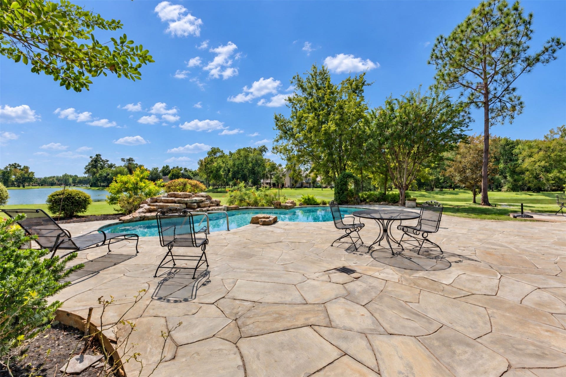 11602 haley hollow, Richmond, TX 77407 The rear patio with extensive lakefront views.