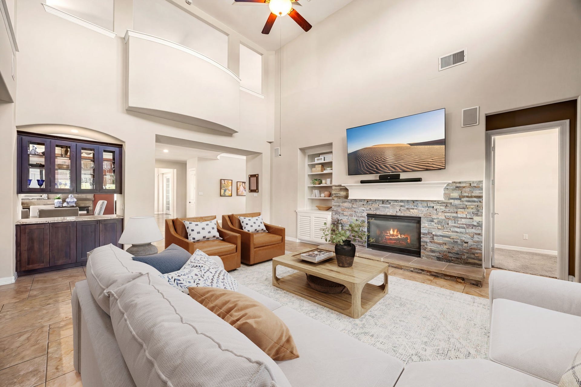 5102 Hawthorne Bend Drive, Katy, TX 77494 Space, light, and style! Soaring ceilings, walls of windows, and an open-concept layout seamlessly connecting the living room to the kitchen make this the heart of the home. *Virtually Staged
