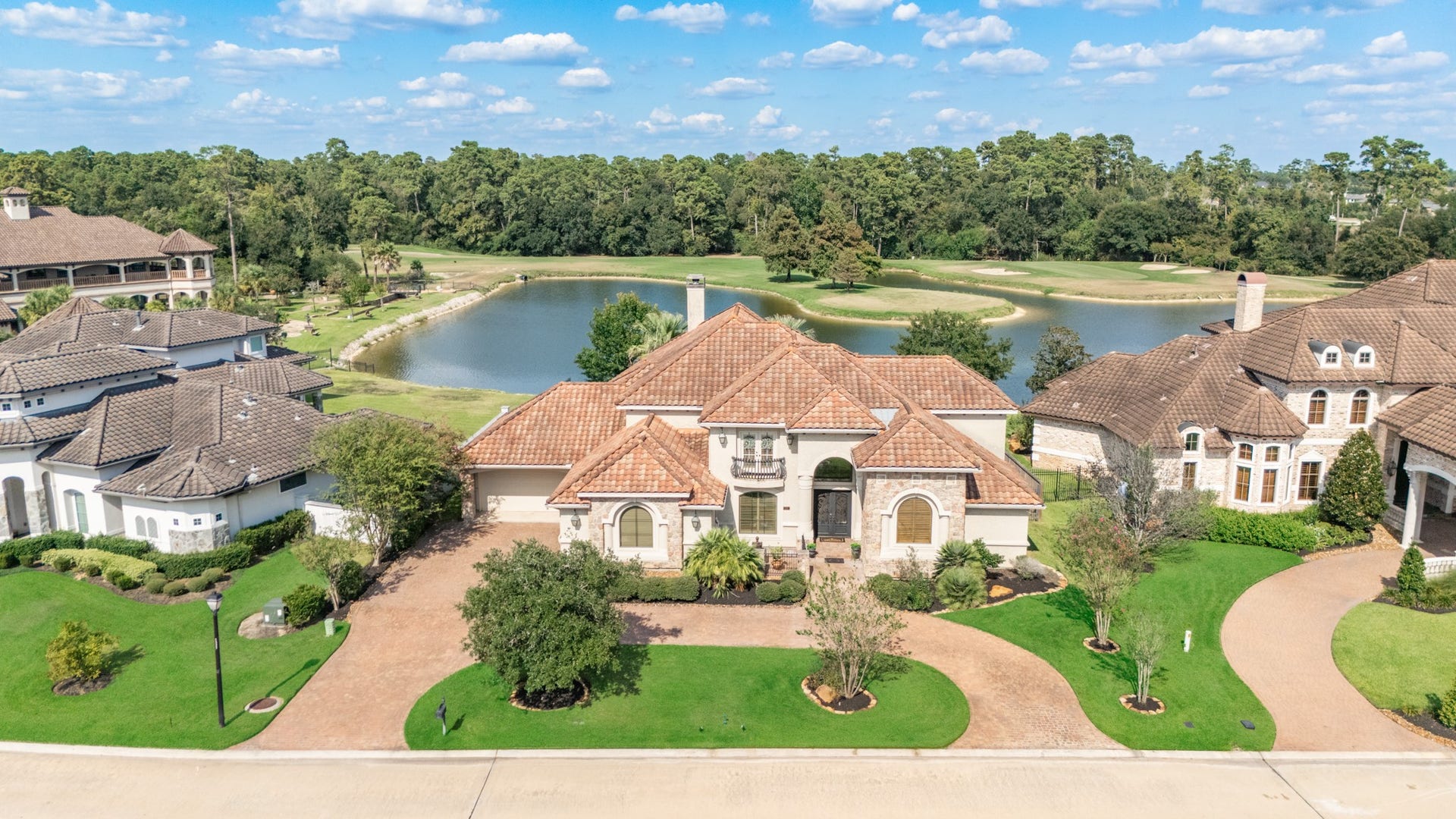 Welcome to this beautiful estate home on a breathtaking oversized lot with waterfront and golf course views.  26 Post Shadow Estates has it all!