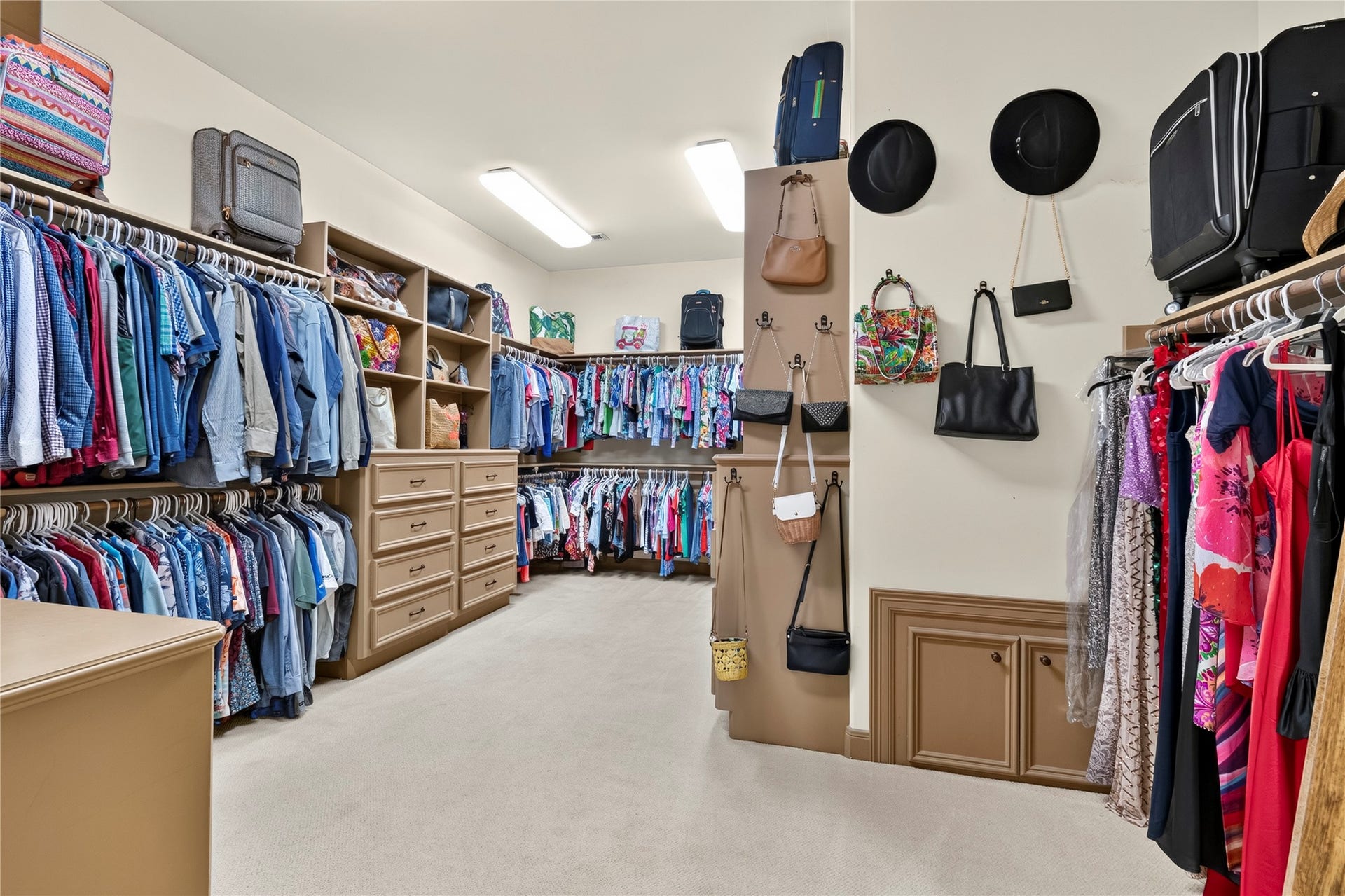 HUGE primary closet with additional built in storage
