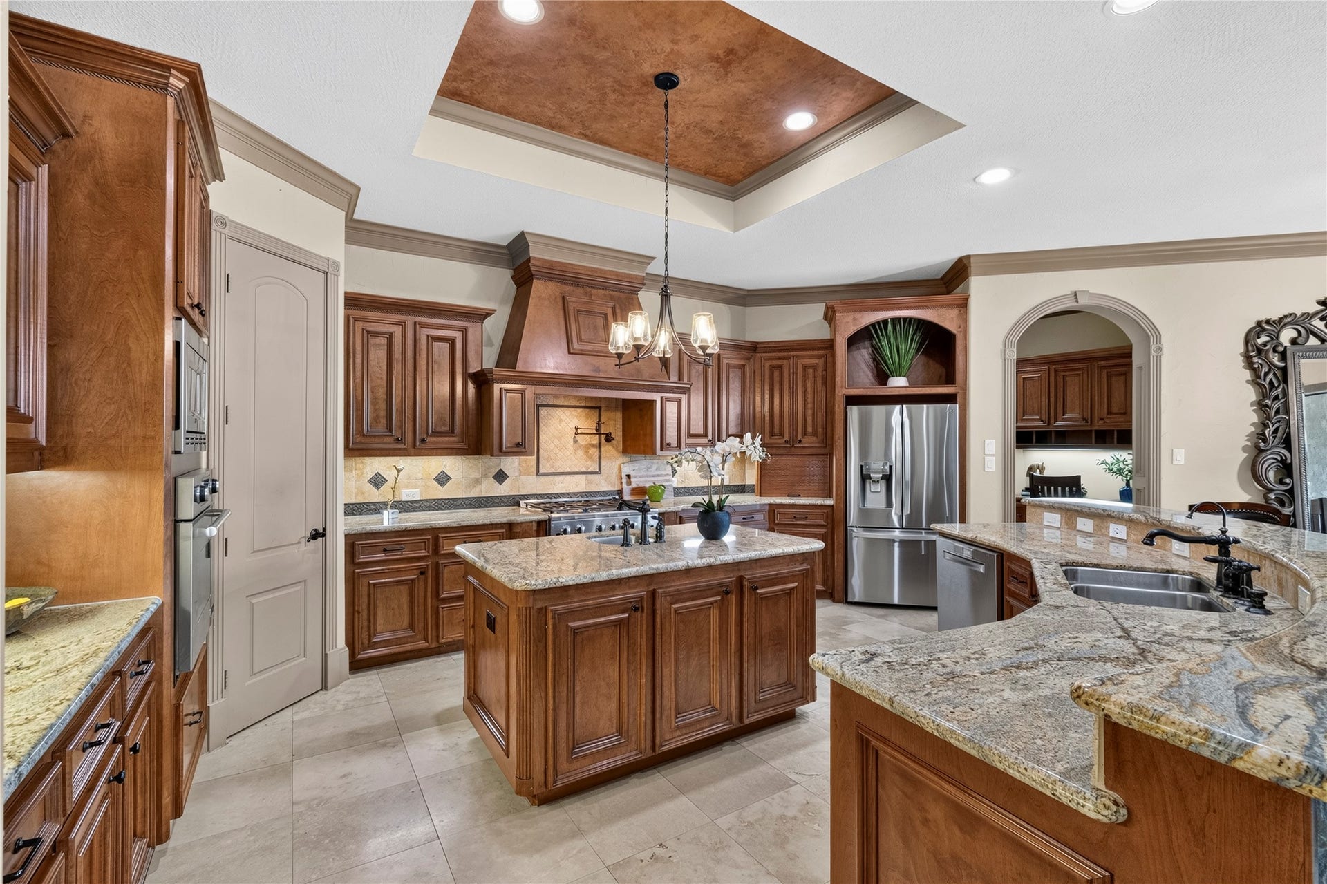 All the details you would want in a kitchen like a prep sink and pot filler.