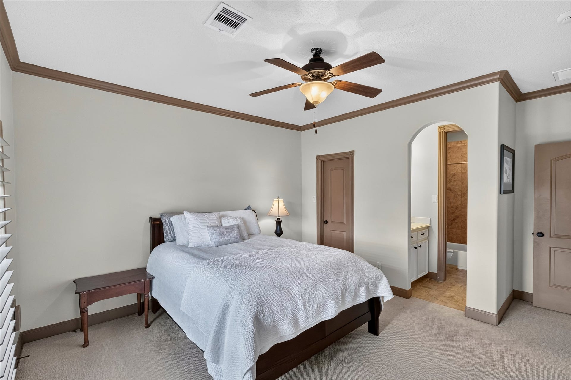 Bedroom #3 upstairs with Holywood bath and french doors that open to a juliet balcony