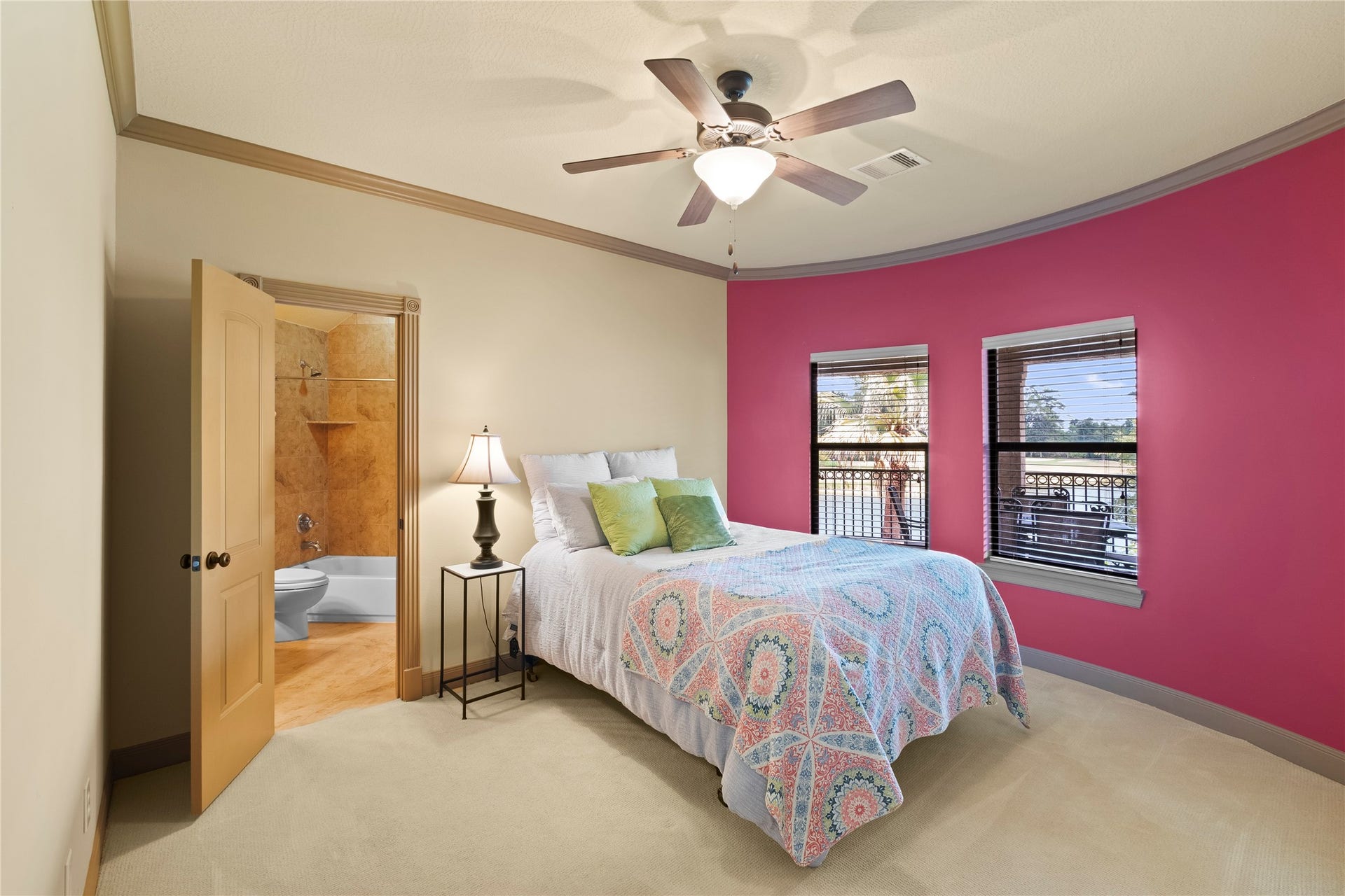 Bedroom #4 is an ensuite bedroom with beautiful views of the backyard and golf course