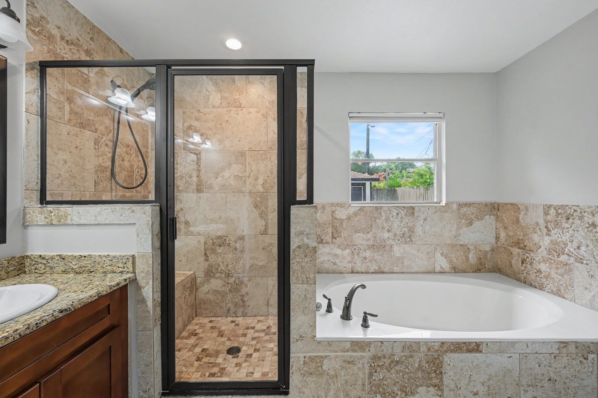 9613 Westview Drive, Houston, TX 77055 Primary bathroom offers a large separate shower and soaking tub!