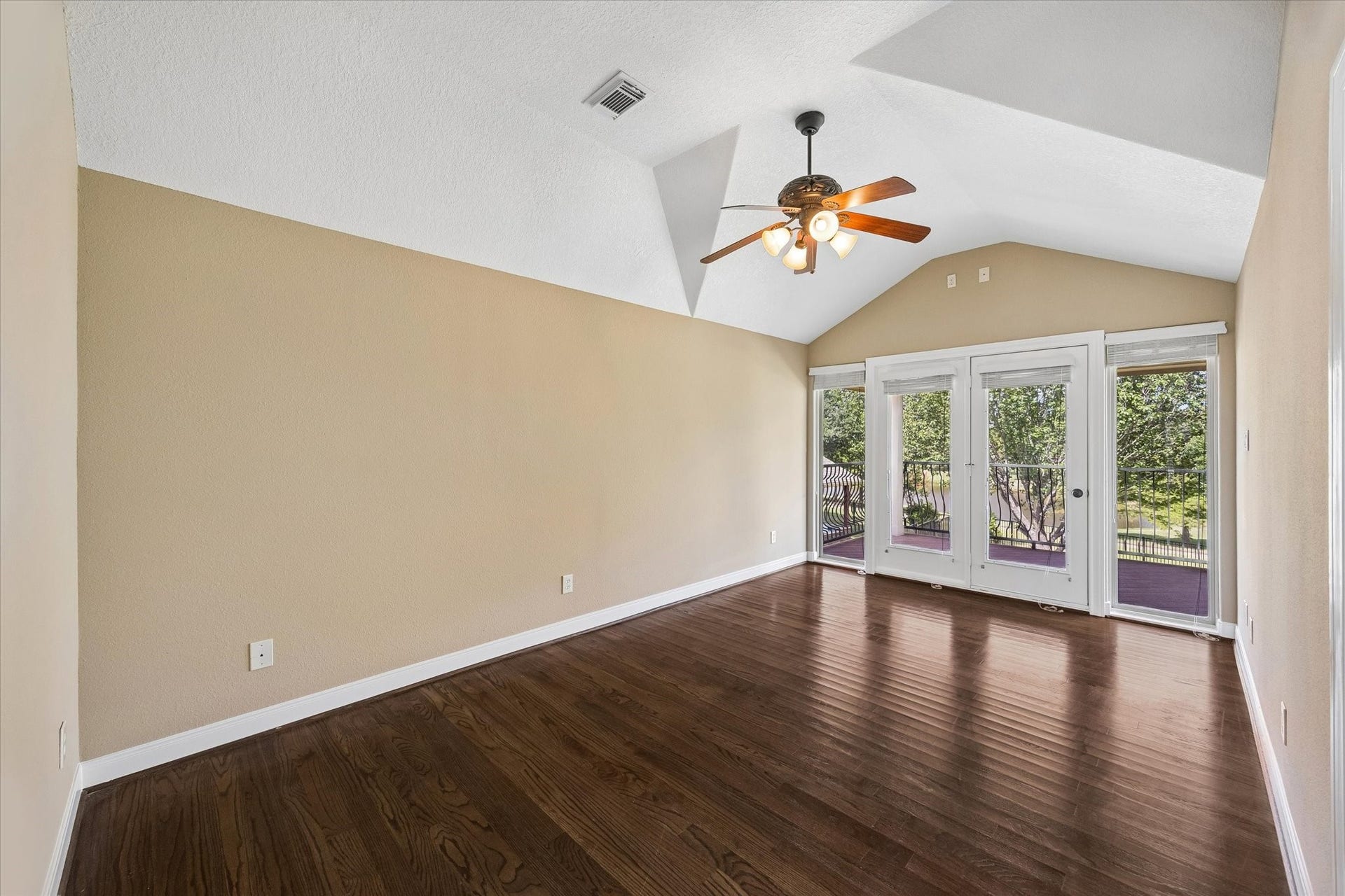 18715 N Thomas Shore Drive, Cypress, TX 77433 En-suite upstairs with beautiful hardwood floors and a private balcony
