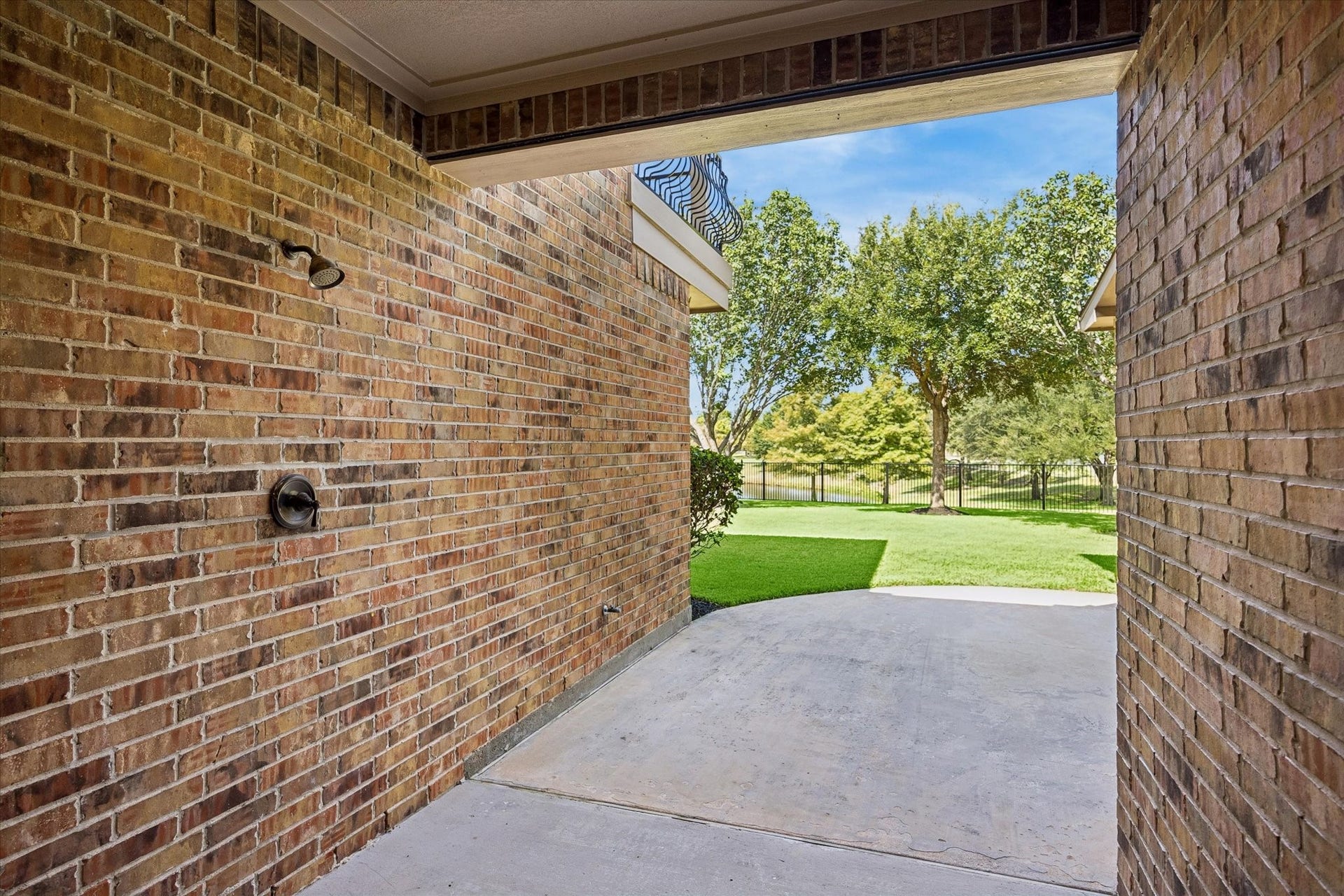 18715 N Thomas Shore Drive, Cypress, TX 77433 Outdoor shower area just off of the garage