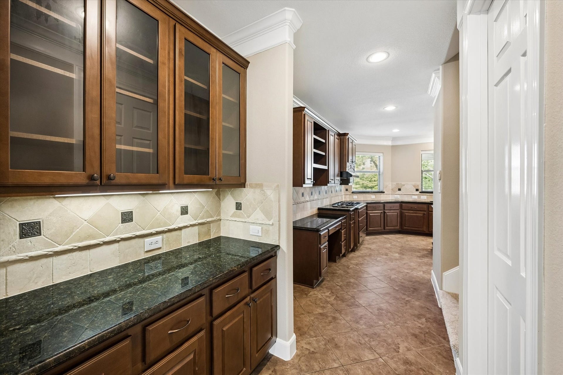 18715 N Thomas Shore Drive, Cypress, TX 77433 Area just off of the formal dining room leading to the utility room and into the kitchen