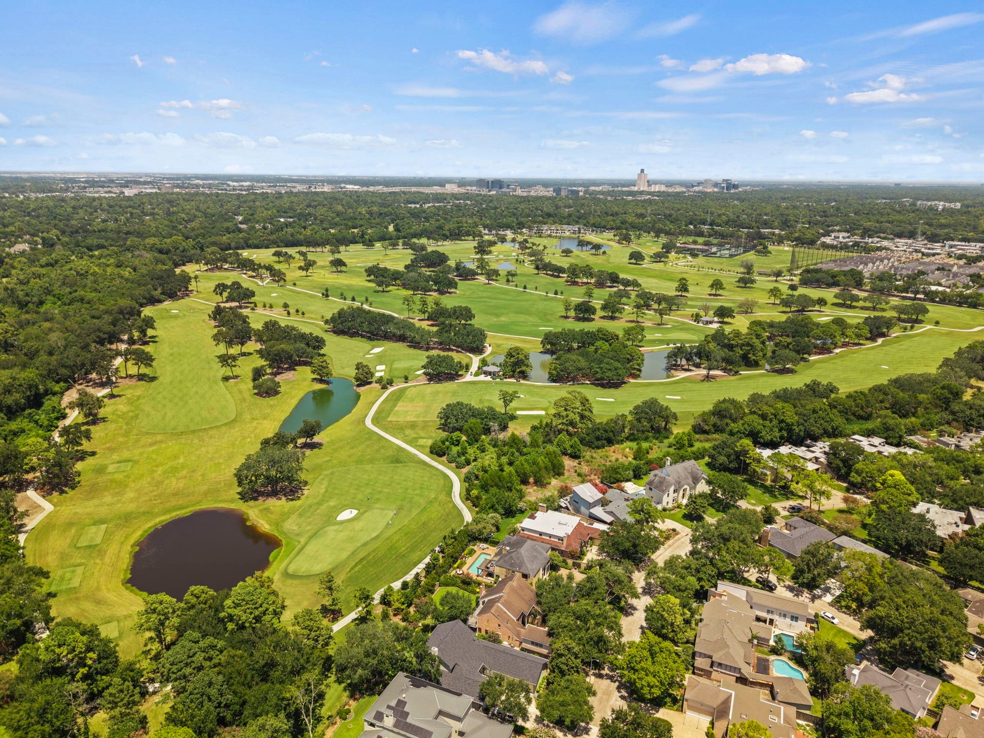 11807 Carriage Hill Drive, Houston, TX 77077 The home is located just steps from Terry Hershey Park and trails, with convenient access to Memorial City, CityCentre, shopping, dining, and major freeway connections. The setting brings together outdoor access and Energy Corridor convenience.