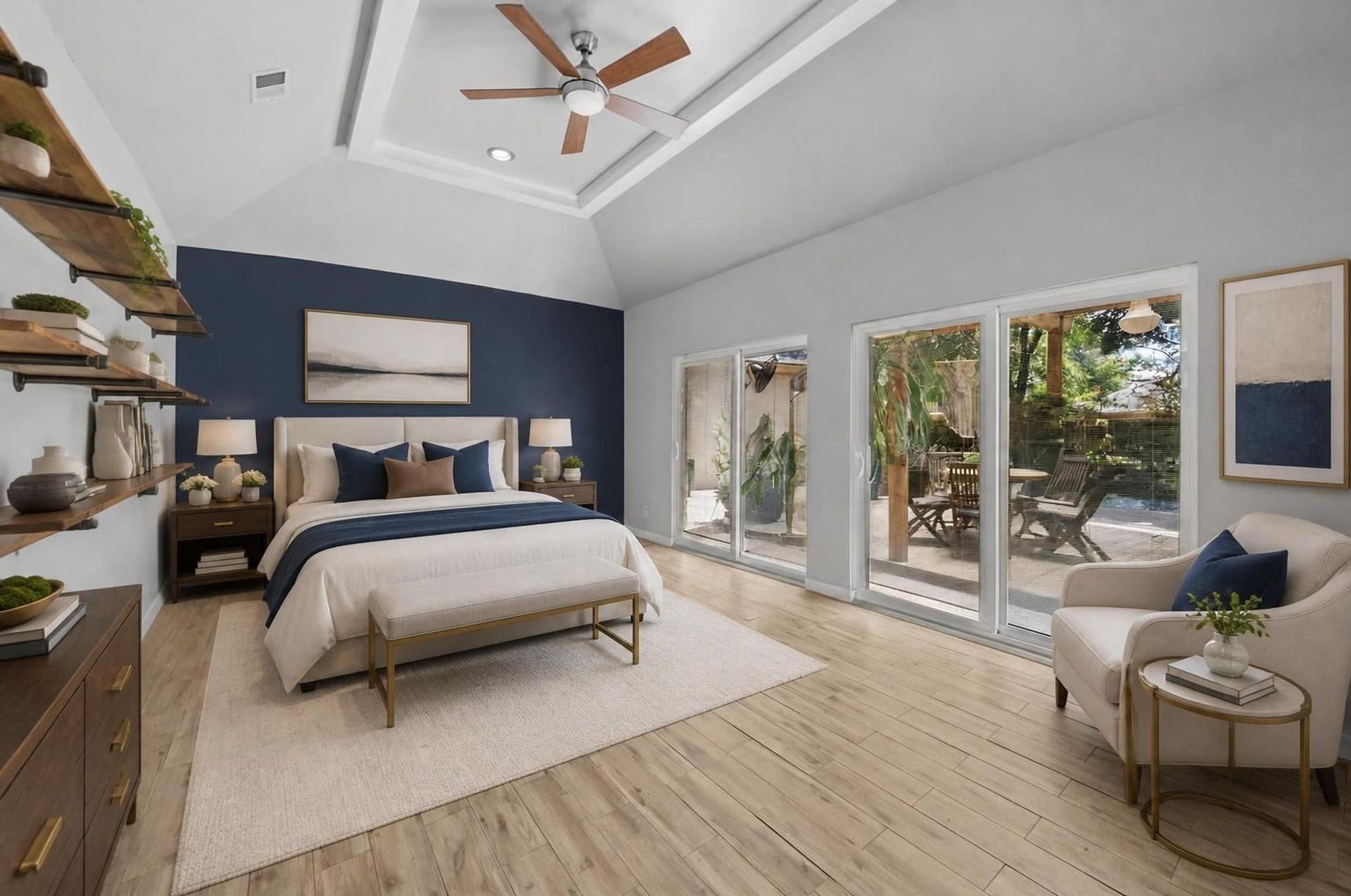 11807 Carriage Hill Drive, Houston, TX 77077 The primary bedroom offers a spacious first-floor retreat with backyard views, vinyl flooring, and direct access to the ensuite bath. Its placement gives the suite privacy while keeping the entire home on one level. Virtually staged.
