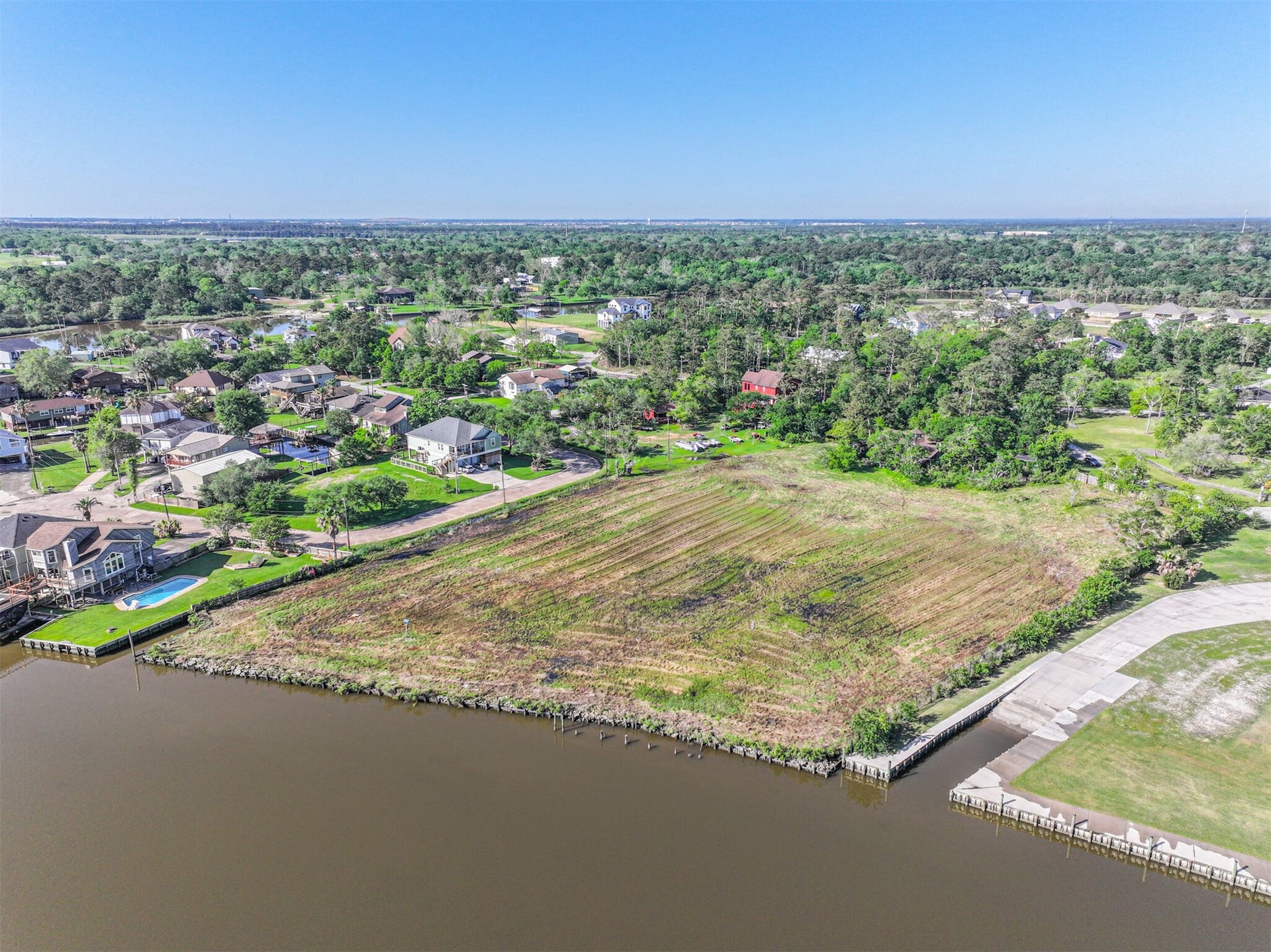 Rare Waterfront Property - Right on the Bayou - Perfect for Boating and Fishing! Build Your Dream Home or Family Compound Here. There is a Home on the Property that is Currently Uninhabitable.