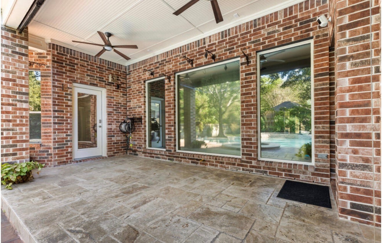 2831 Hazy Hillside Court, Houston, TX 77345 Covered patio with access from the primary room and kitchen
