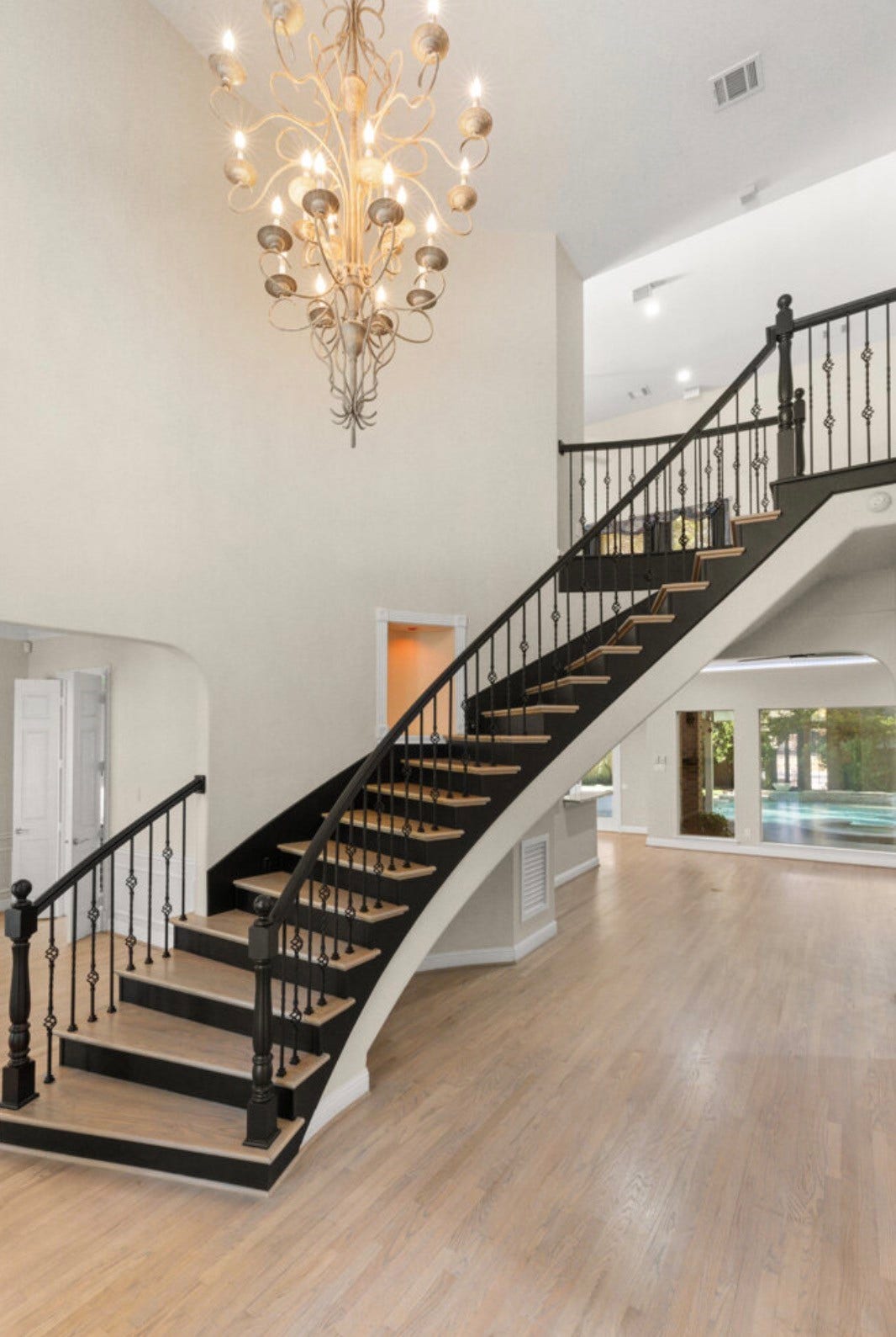 2831 Hazy Hillside Court, Houston, TX 77345 Grand front staircase