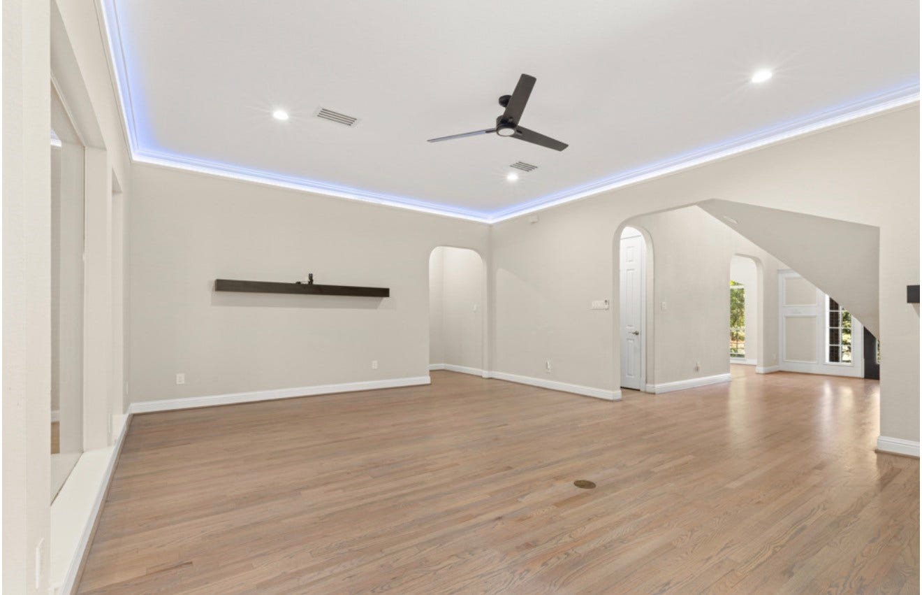 2831 Hazy Hillside Court, Houston, TX 77345 Living area with custom lighting - can be changed for holidays