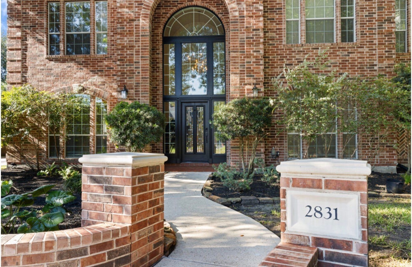 2831 Hazy Hillside Court, Houston, TX 77345 Grandiose entryway