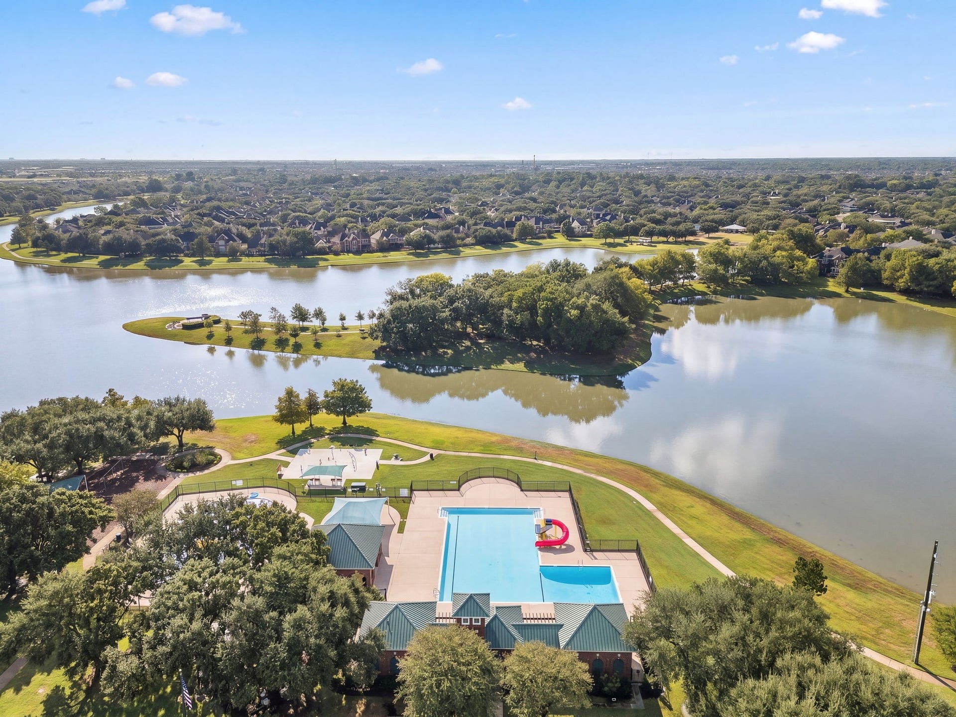 4807 Lake Wichita Lane, Richmond, TX 77407 Enjoy the Waterside Estates community center with a swimming pool, splash pad, tennis court, and playground.