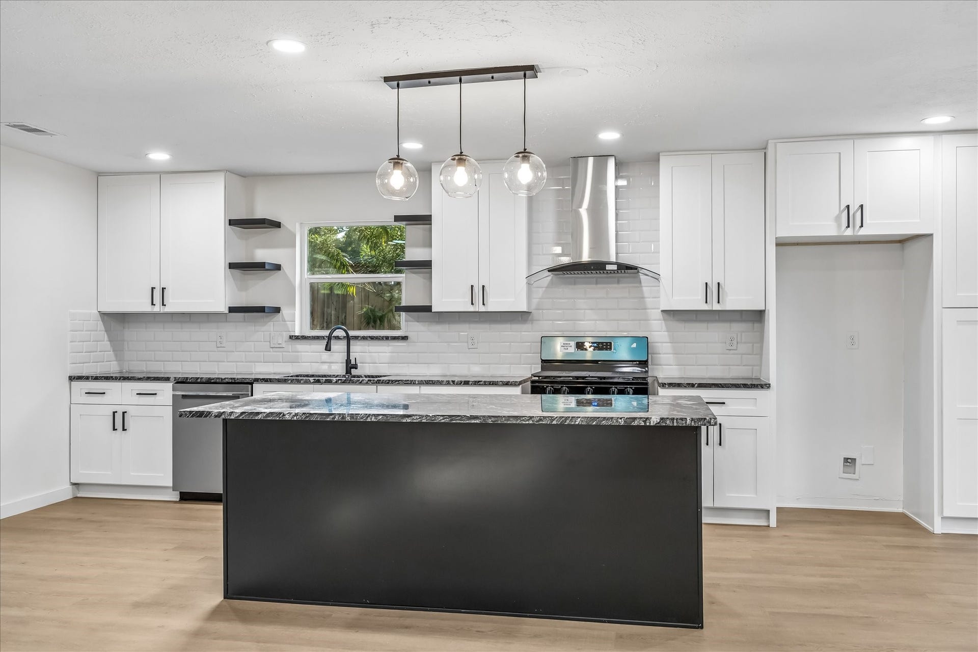 3430 Sycamore Shadows Drive, Kingwood, TX 77339 New cabinets and huge island