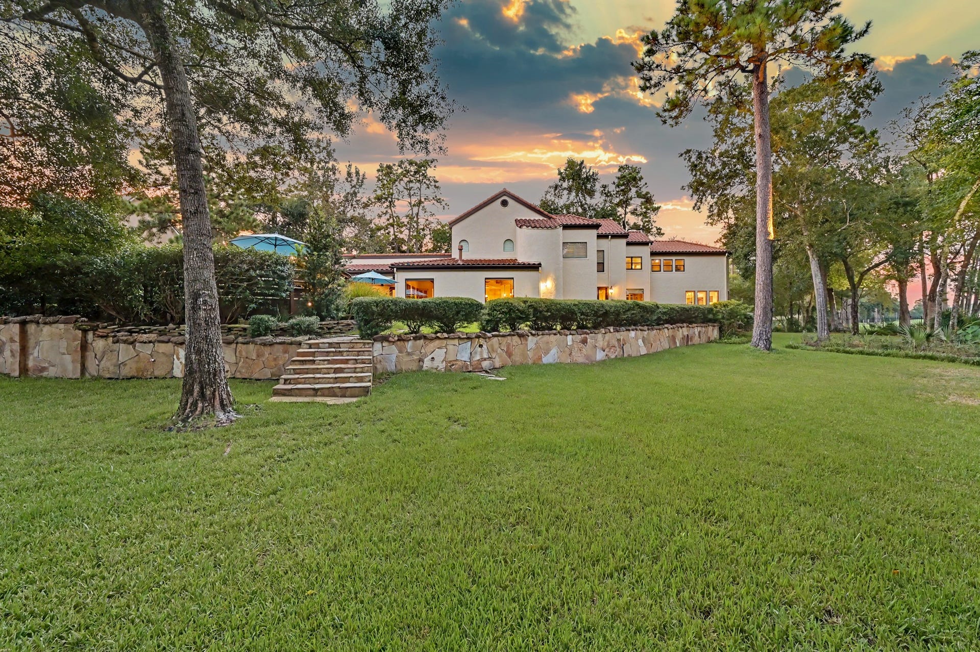 Lower level of backyard features almost a half acre of flat land, great opportunity for a playground or entertaining