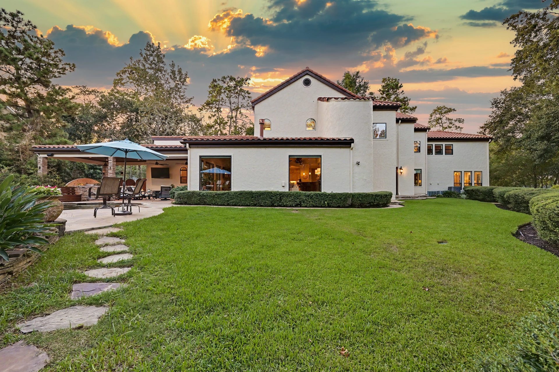 Gorgeous view of backyard looking at the rear of the house.
