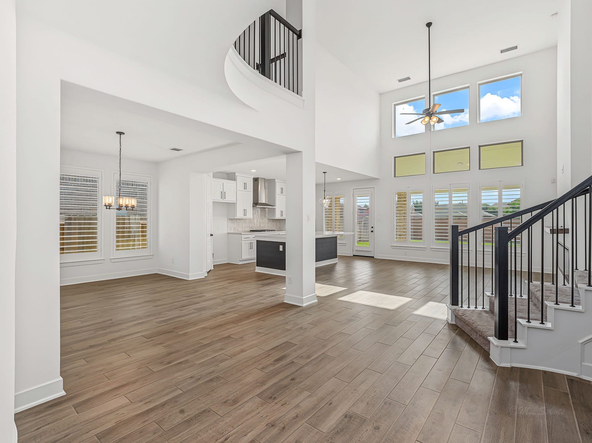 8730 Flounder Rosa Lane, Cypress, TX 77433 View of formal dinning, kitchen and family room
