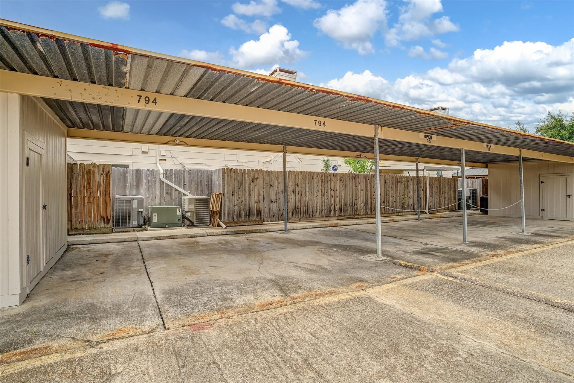 794 Thicket Lane, Houston, TX 77079 2 dedicated parking spots as well as a storage shed. Direct access from the back of the home.