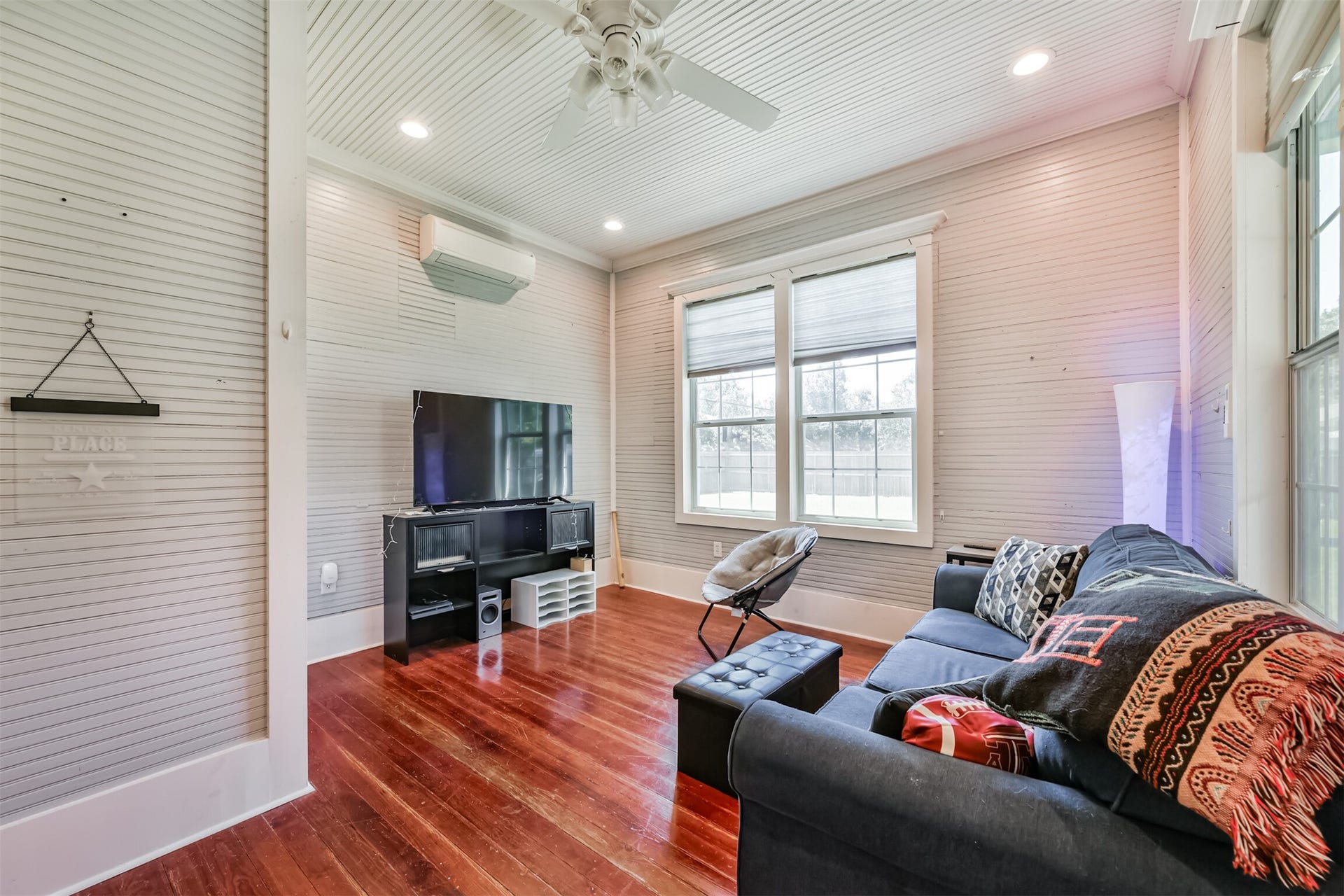 503 W Blum Street, Alvin, TX 77511 Versatile main-level room offers flexibility as a bedroom, private office or separate living space.