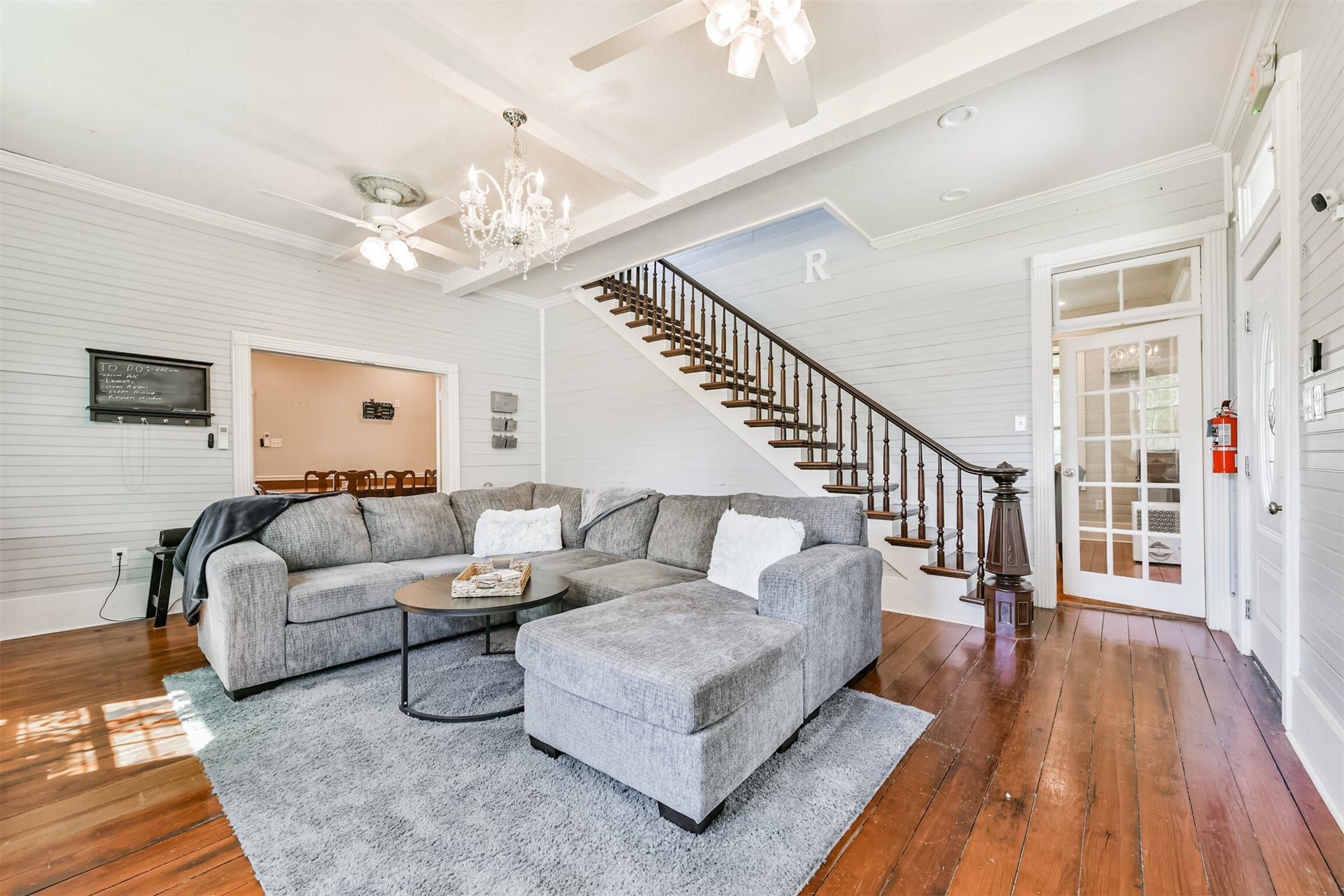 503 W Blum Street, Alvin, TX 77511 Historic character meets everyday comfort in this generous main living space.