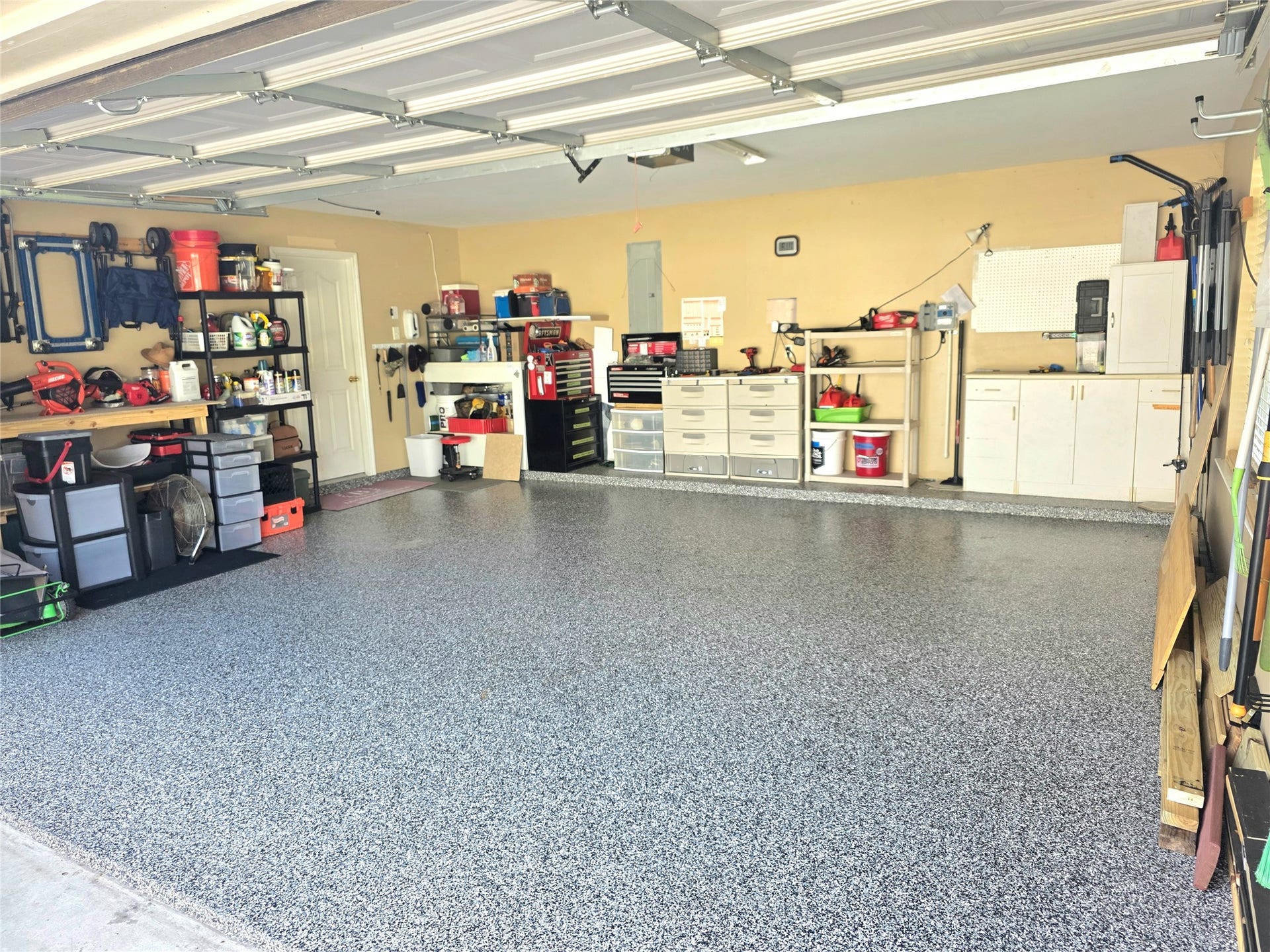 220 April Waters Drive W, Montgomery, TX 77356 Spacious garage with the nice epoxy coating on the floor