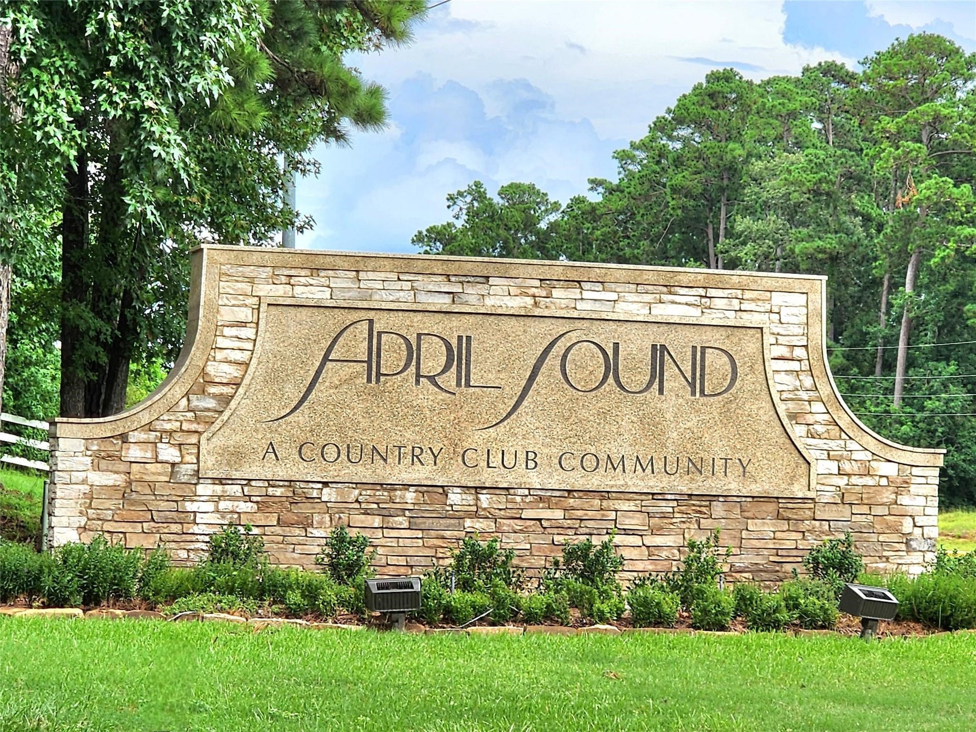 220 April Waters Drive W, Montgomery, TX 77356 Entrance into the gated community of April Sound