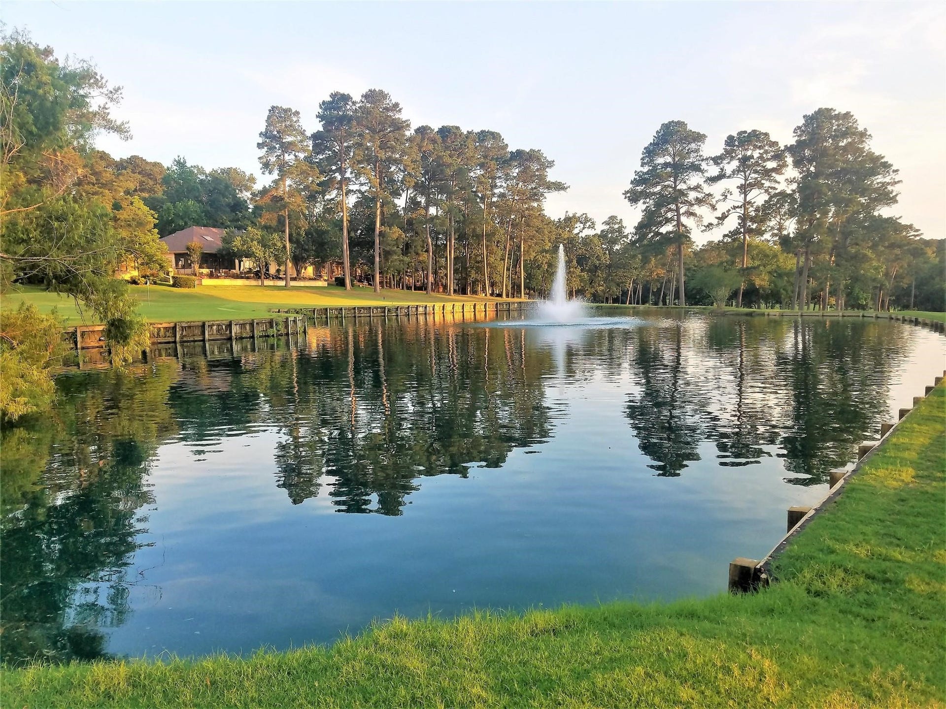 220 April Waters Drive W, Montgomery, TX 77356 One of many beautiful holes of the 27 hole golf course in April Sound