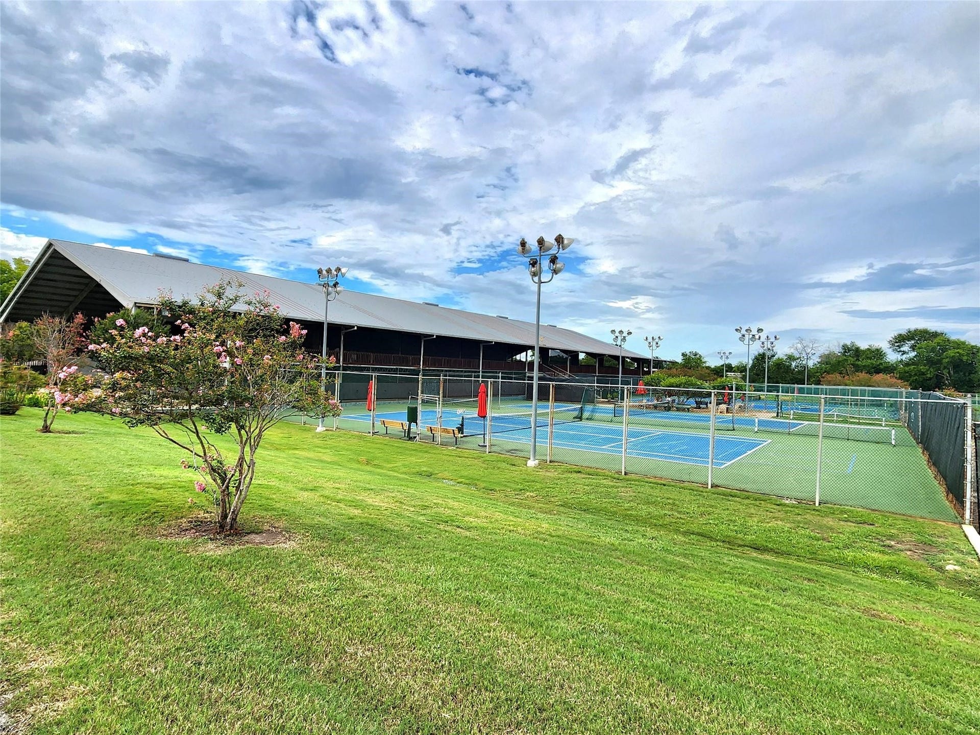 220 April Waters Drive W, Montgomery, TX 77356 Lots of tennis and pickle ball courts for the active residents