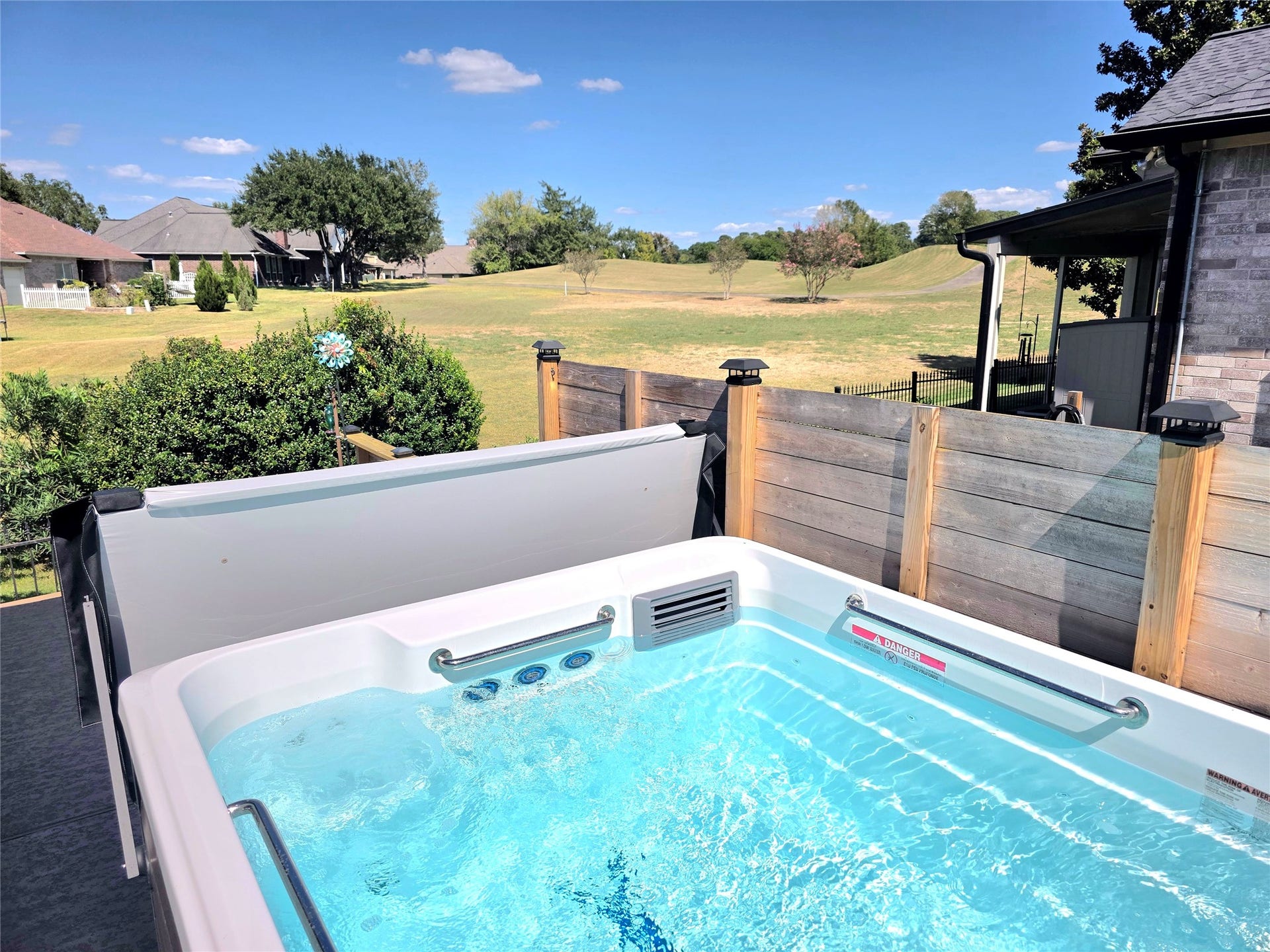 220 April Waters Drive W, Montgomery, TX 77356 Have your tee time and then enjoy your cool down time in this very private and wonderful swim spa with this great view!