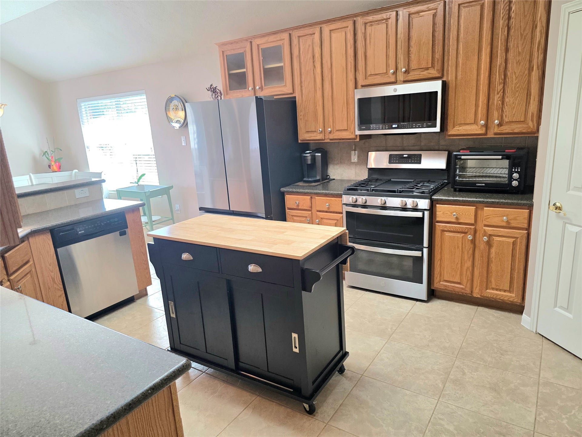 220 April Waters Drive W, Montgomery, TX 77356 Gas cooktop and double oven with convection available